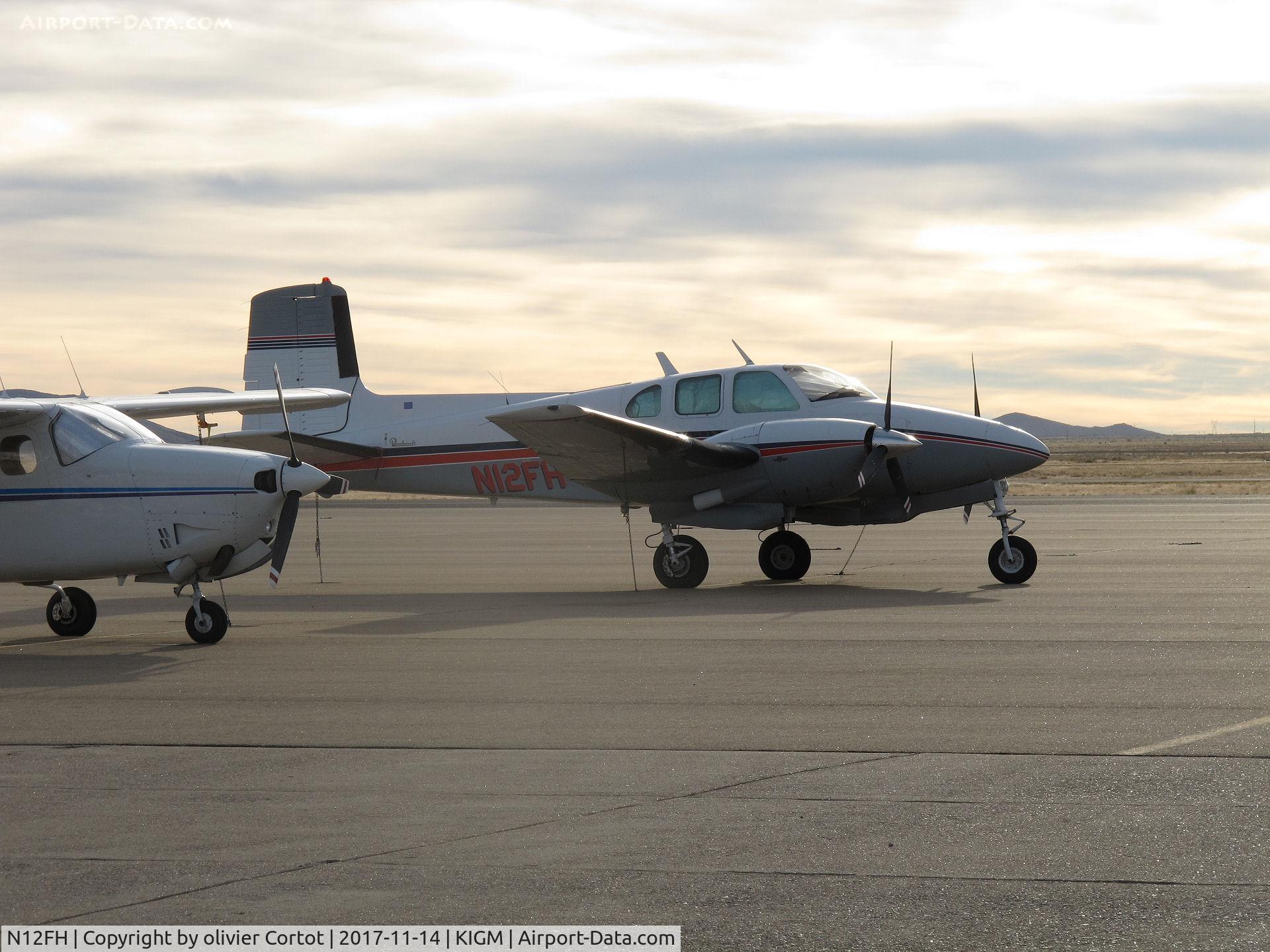 N12FH, 1956 Beech D50 Twin Bonanza C/N DH-63, near the airport café