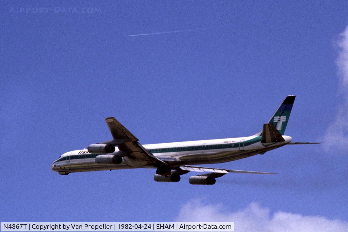 N4867T, Douglas DC-8-63CF C/N 46090, Transamerica Airlines Douglas DC-8-63CF climbing away from Schiphol airport, the Netherlands, 1982