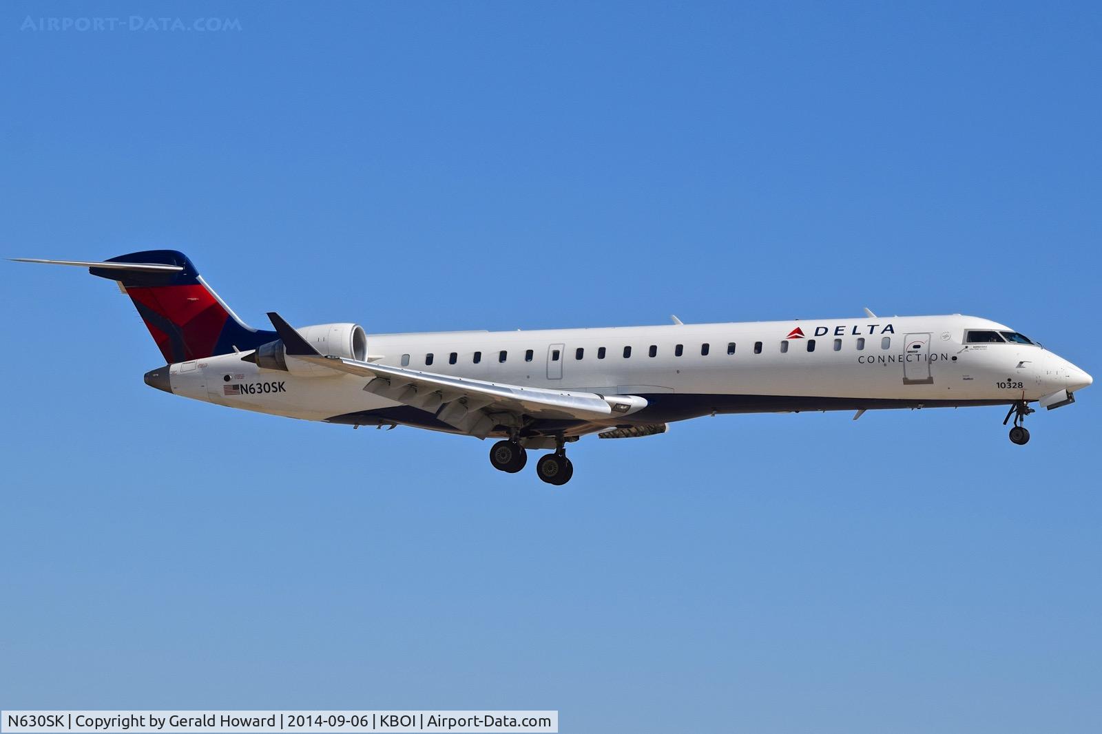 N630SK, 2011 Bombardier CRJ-700 (CL-600-2C10) Regional Jet C/N 10328, Landing RWY 10R.