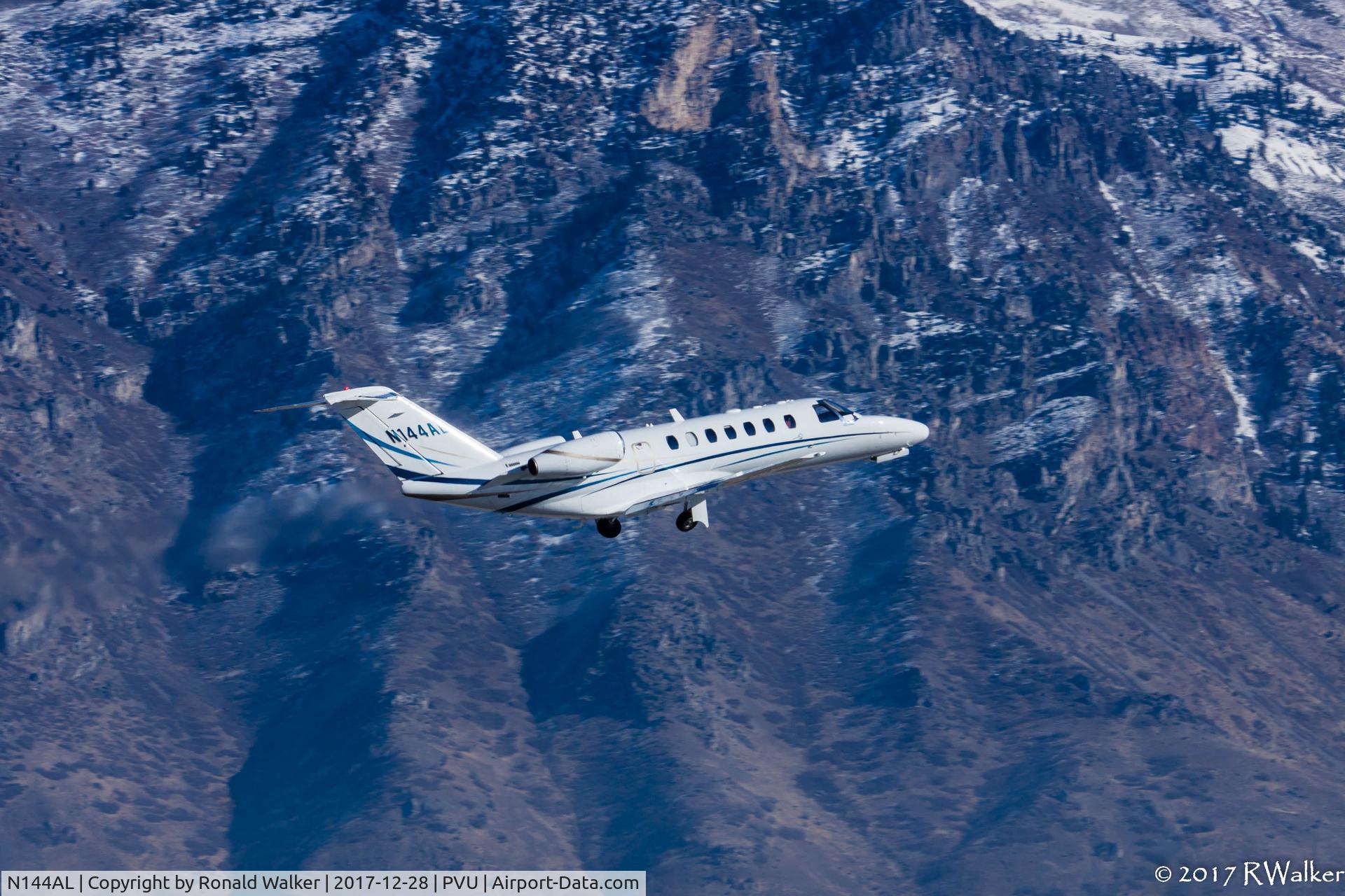 N144AL, 2005 Cessna 525B CitationJet CJ3 C/N 525B-0044, Utah Valley, Utah.  Wasatch Mountains in background