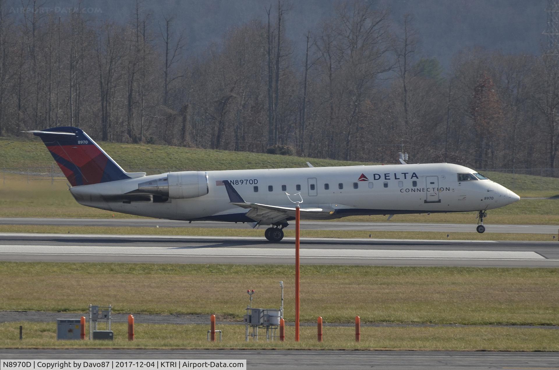 N8970D, 2004 Bombardier CRJ-200 (CL-600-2B19) C/N 7970, Touching down for landing at Tri-Cities Airport (KTRI) in Blountville, TN.