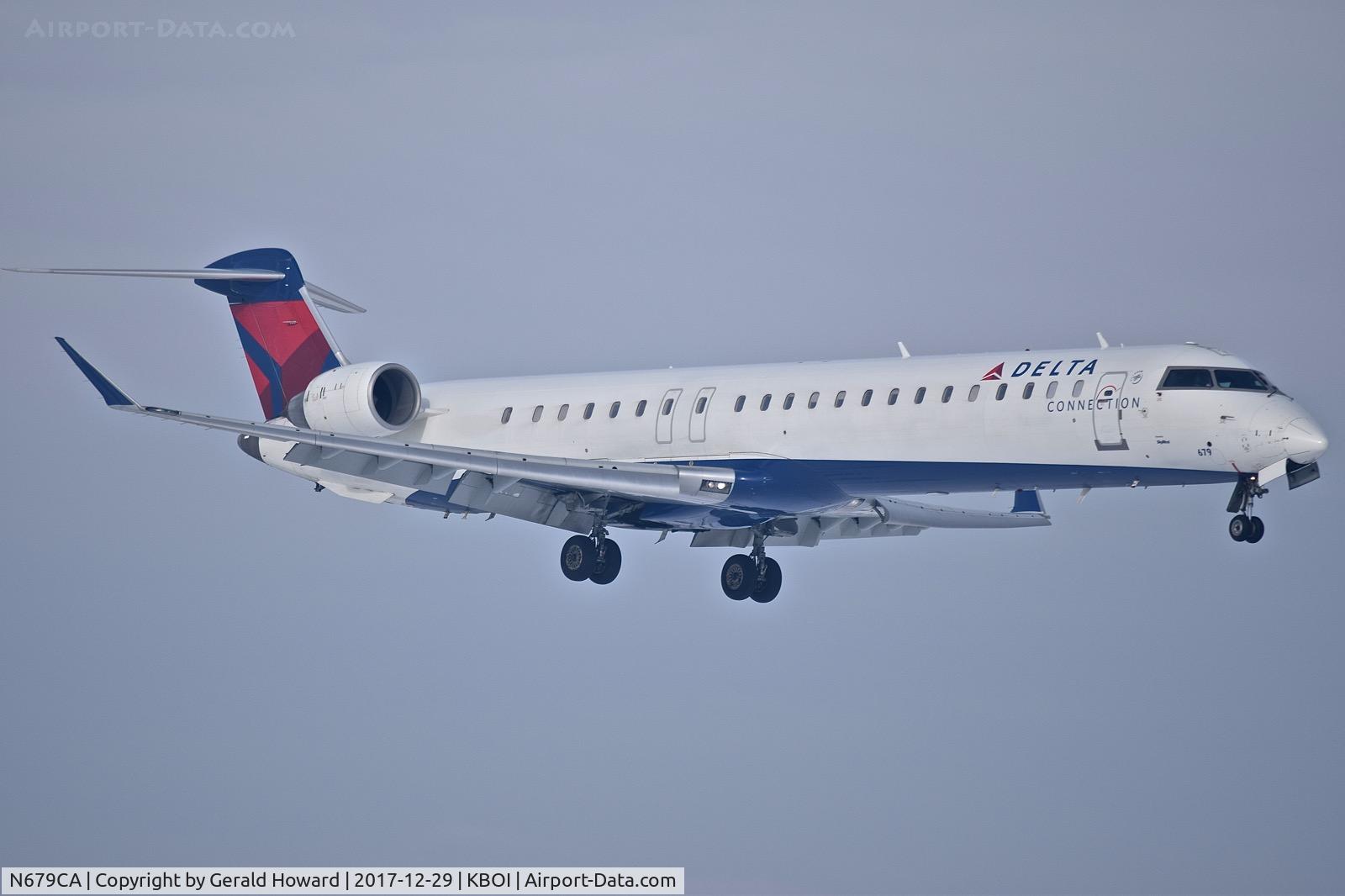 N679CA, 2007 Bombardier CRJ-900ER (CL-600-2D24) C/N 15132, landing RWY 10R.