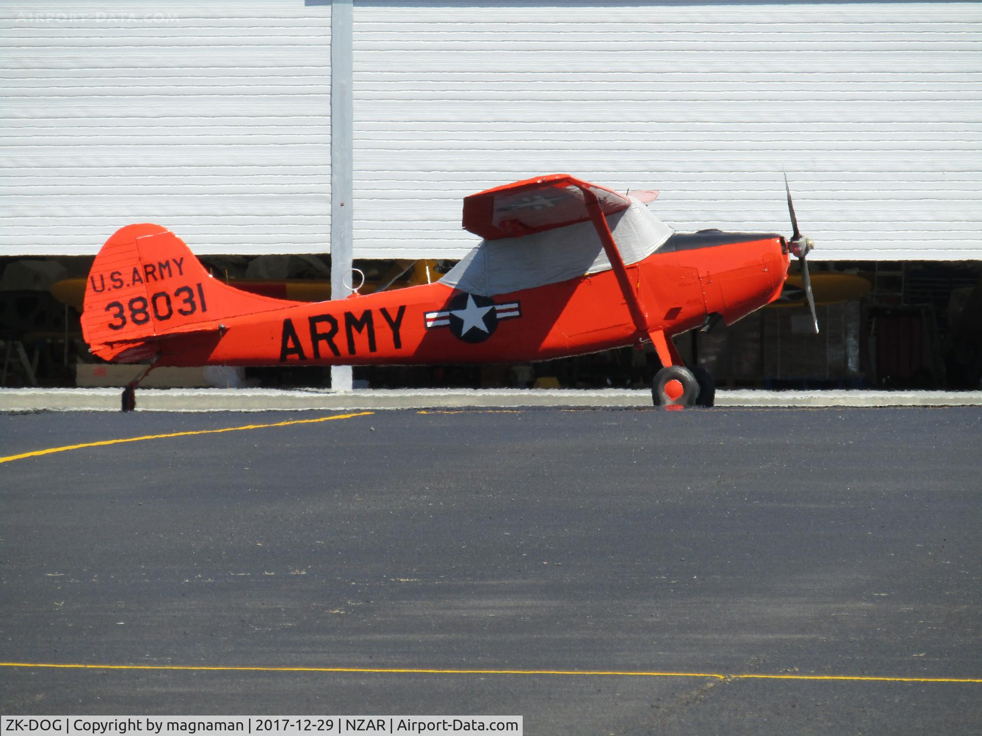 ZK-DOG, 1953 Cessna L-19A Bird Dog C/N 23452, outside hangar at ardmore