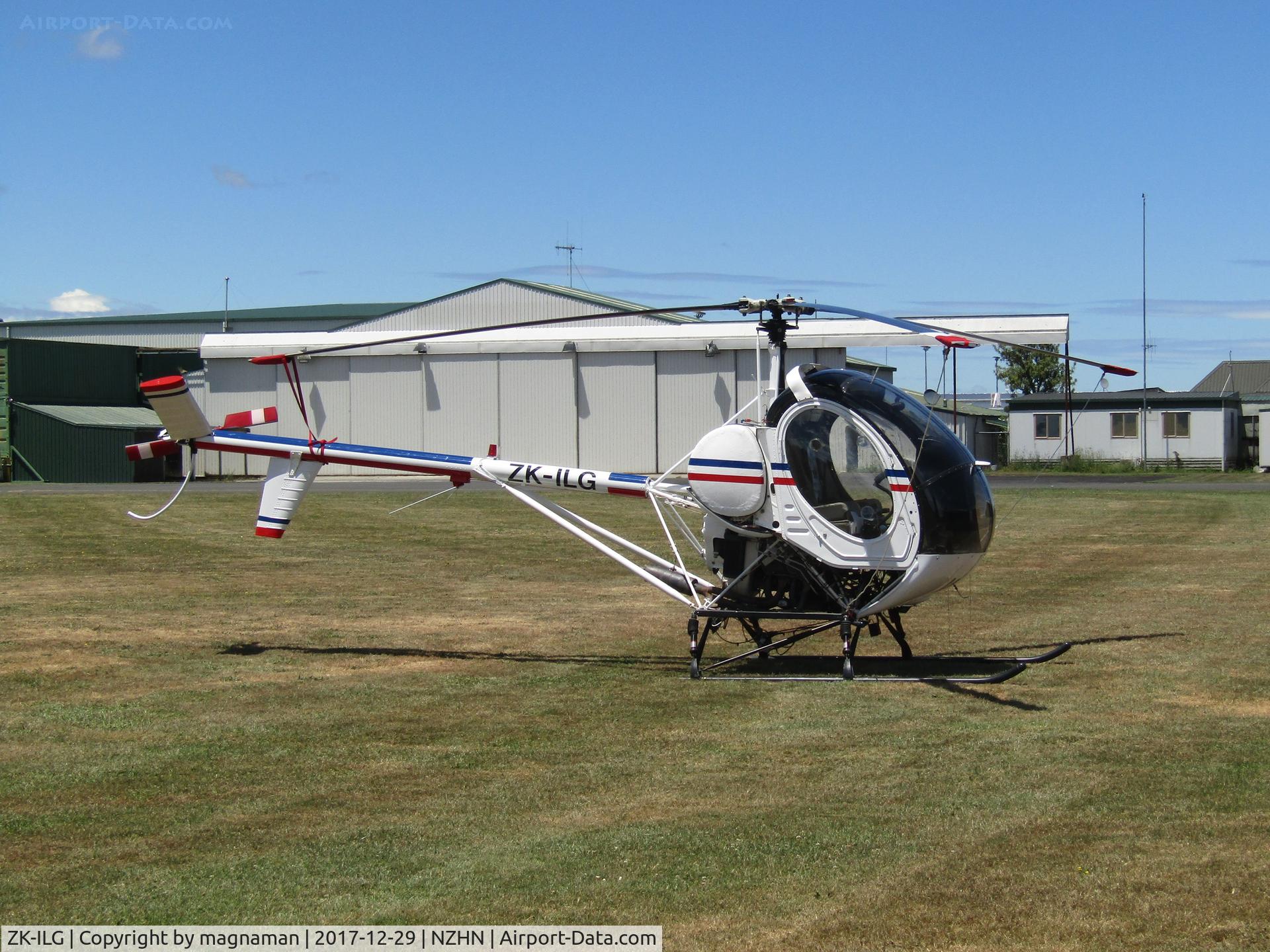 ZK-ILG, Schweizer 269C C/N S1644, on grass at Hamilton