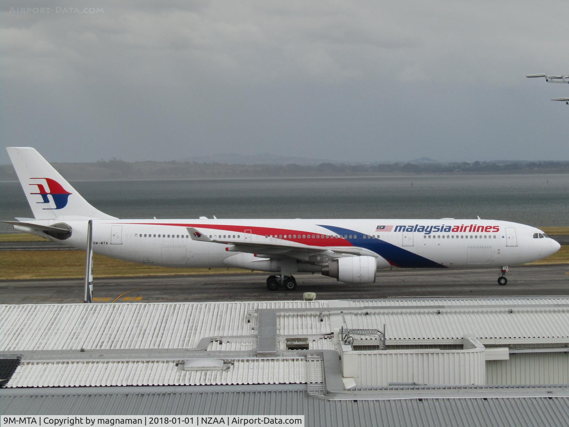 9M-MTA, 2011 Airbus A330-323 C/N 1209, taxying to stand