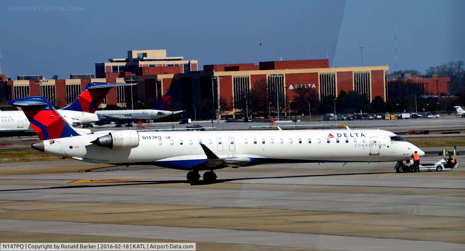 N147PQ, 2007 Bombardier CRJ-900ER (CL-600-2D24) C/N 15147, Pushback Atlanta