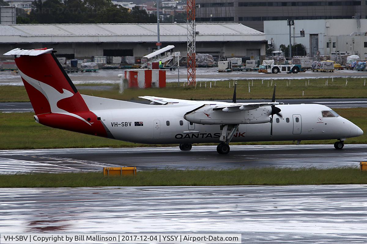 VH-SBV, 2003 De Havilland Canada DHC-8-315Q Dash 8 C/N 595, TAXI IN THE WET