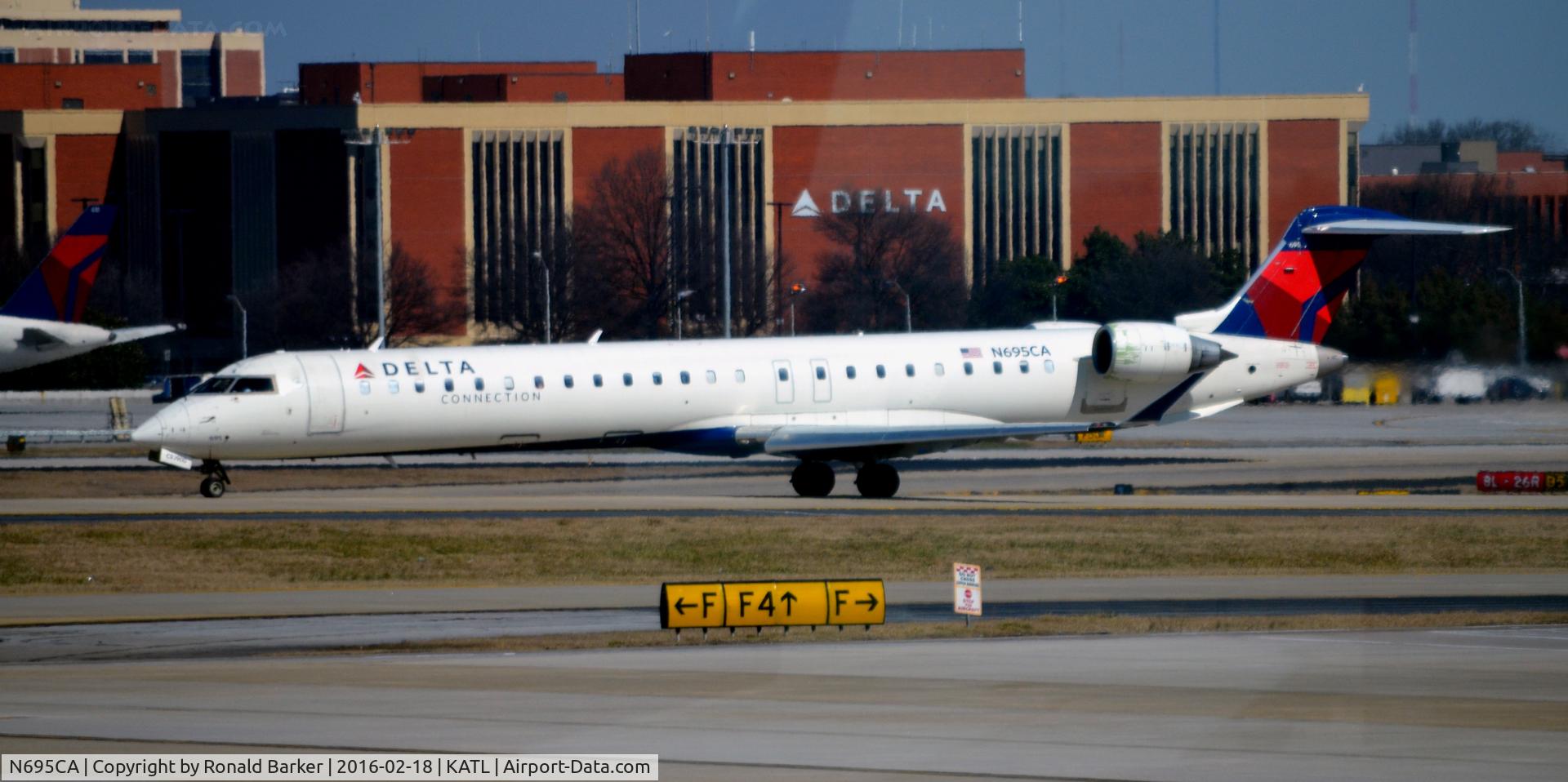 N695CA, 2006 Bombardier CRJ-900ER (CL-600-2D24) C/N 15097, Taxi Atlanta