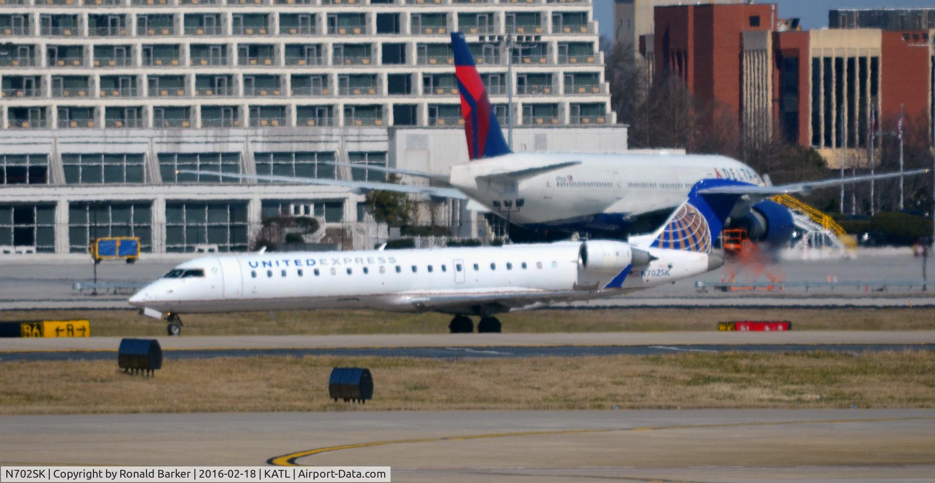 N702SK, 2004 Bombardier CRJ-701ER (CL-600-2C10) Regional Jet C/N 10136, Taxi Atlanta