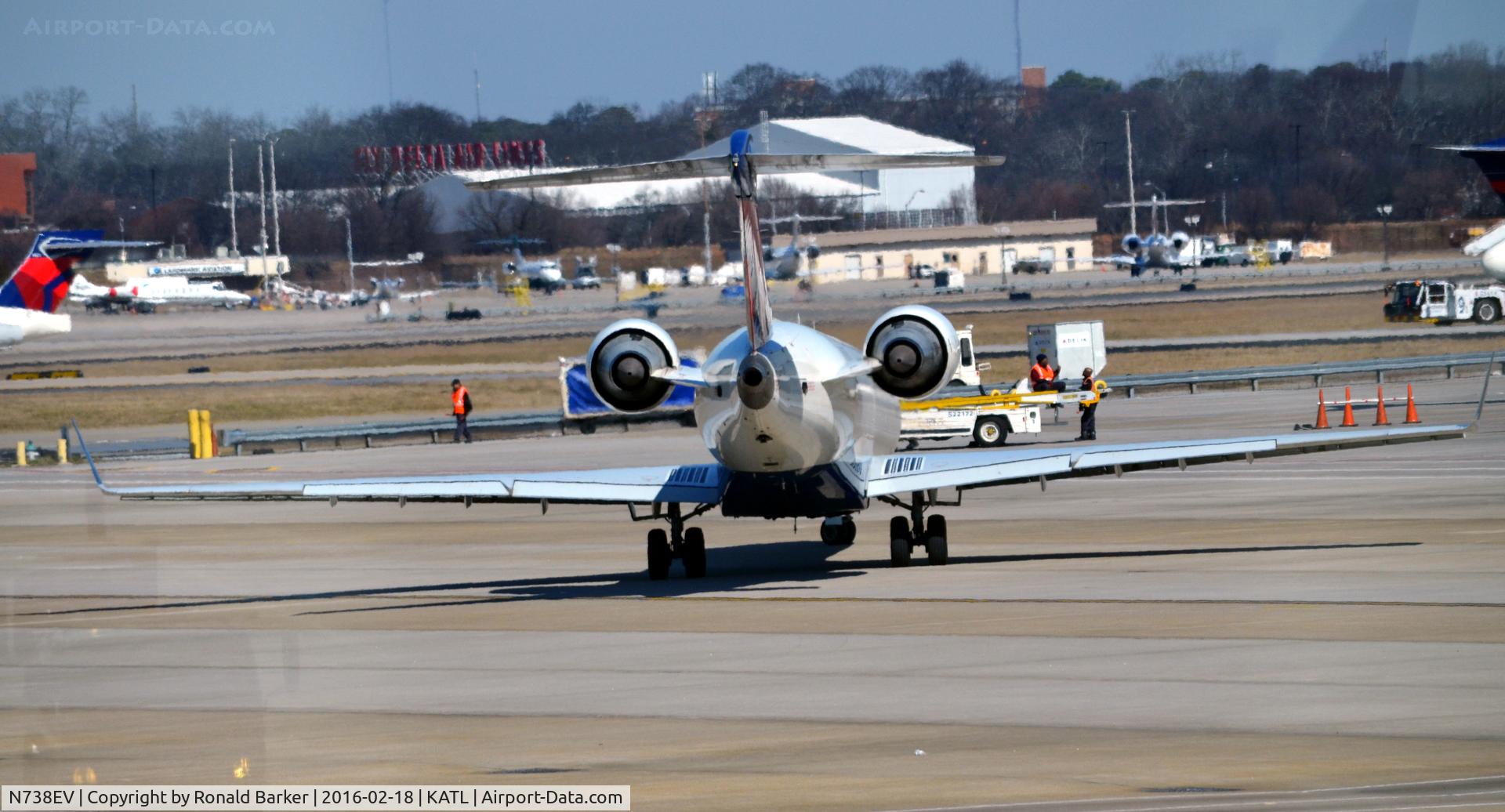 N738EV, 2004 Bombardier CRJ-701 (CL-600-2C10) Regional Jet C/N 10146, Taxi for takeoff Atlanta