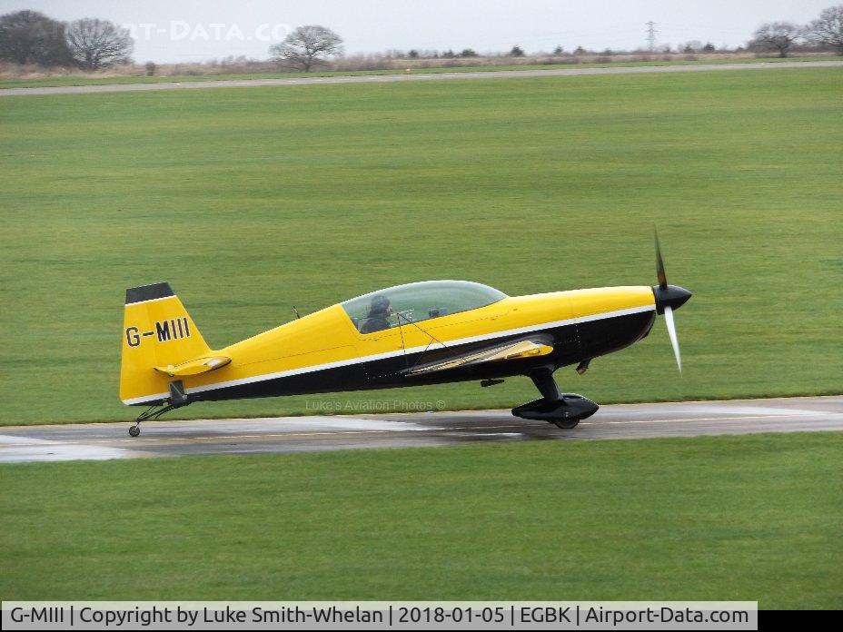G-MIII, 1995 Extra EA-300L C/N 013, Parking on the apron at Sywell Aerodrome.