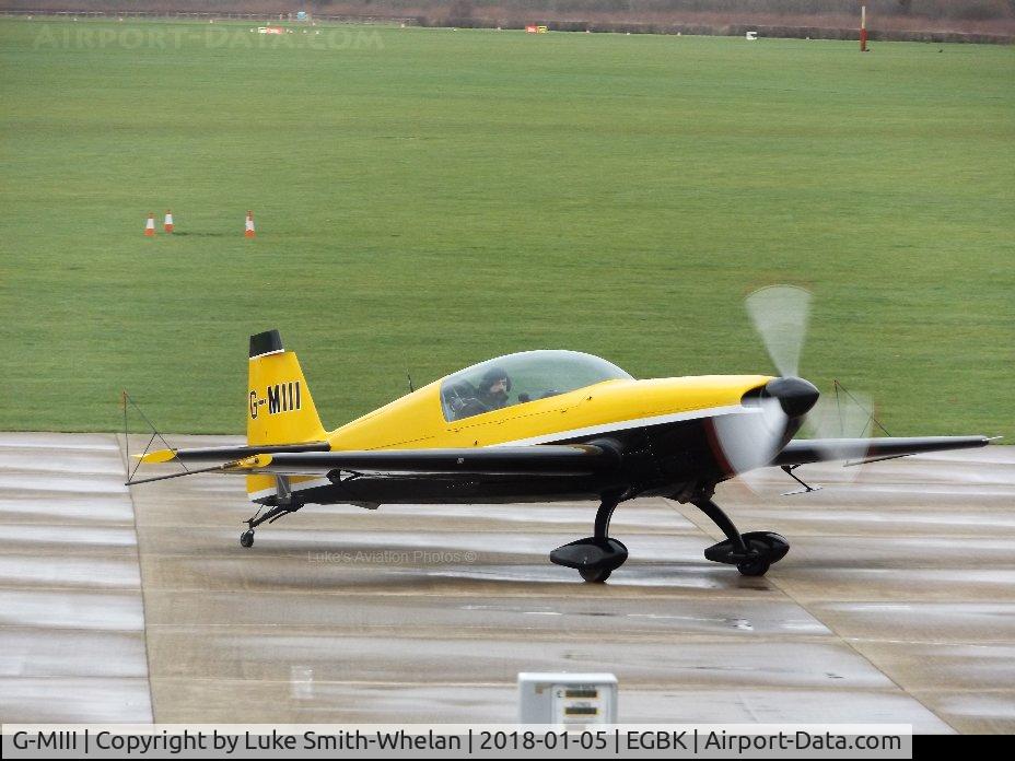 G-MIII, 1995 Extra EA-300L C/N 013, Parking on the apron at Sywell Aerodrome.