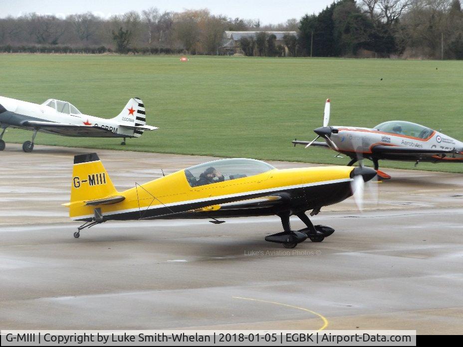 G-MIII, 1995 Extra EA-300L C/N 013, Parking on the apron at Sywell Aerodrome. The pilot is also waving at myself as I was taking photos.