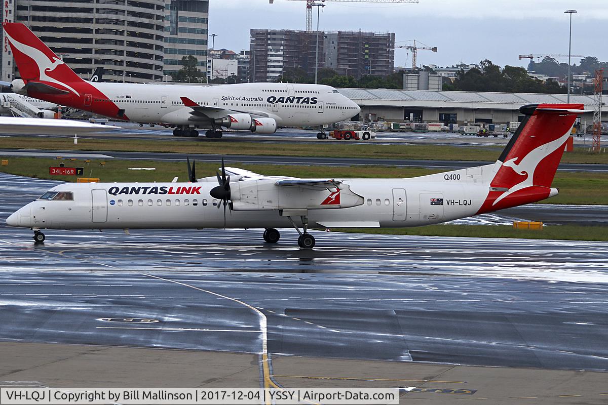 VH-LQJ, 2012 Bombardier DHC-8-402 Dash 8 C/N 4414, TAXI TO A WET 16R