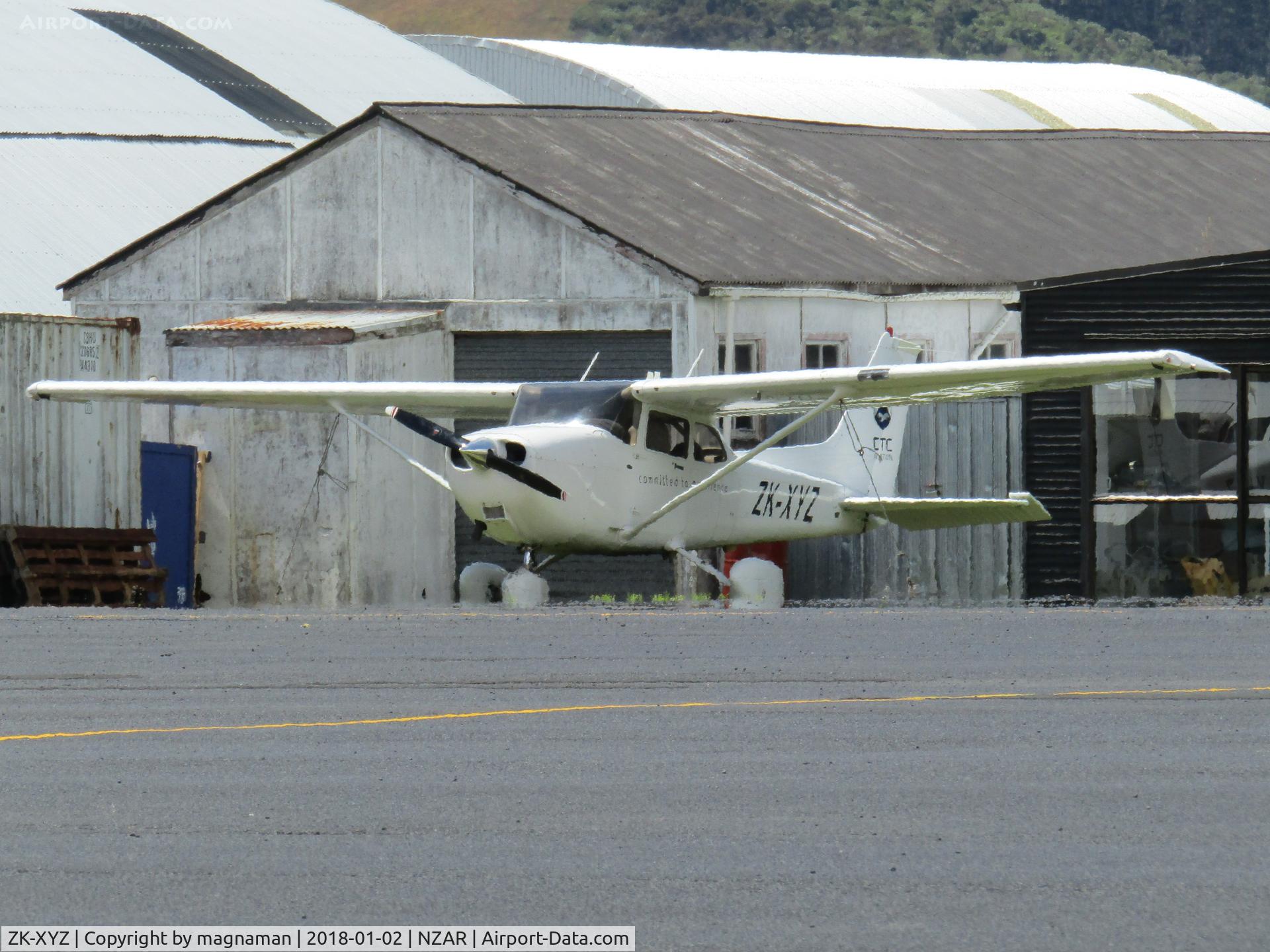 ZK-XYZ, 2005 Cessna 172S C/N 172S-9926, sat in summer haze at AMZ