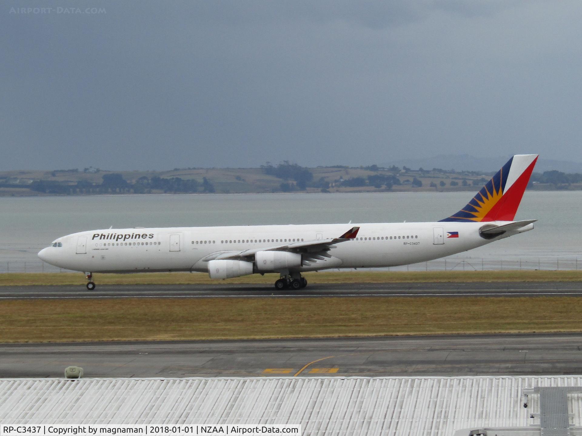 RP-C3437, 2000 Airbus A340-313 C/N 332, rolling down runway after landing