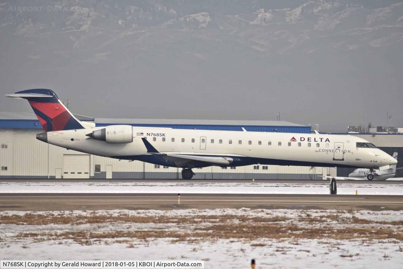 N768SK, 2005 Bombardier CRJ-701ER (CL-600-2C10) Regional Jet C/N 10234, Take off roll on RWY 10L.