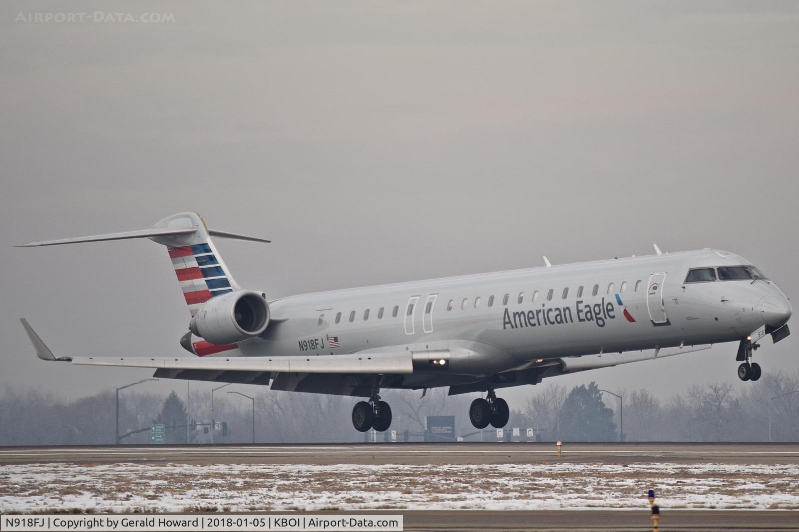 N918FJ, 2004 Bombardier CRJ-900ER (CL-600-2D24) C/N 15018, Landing RWY 10R.