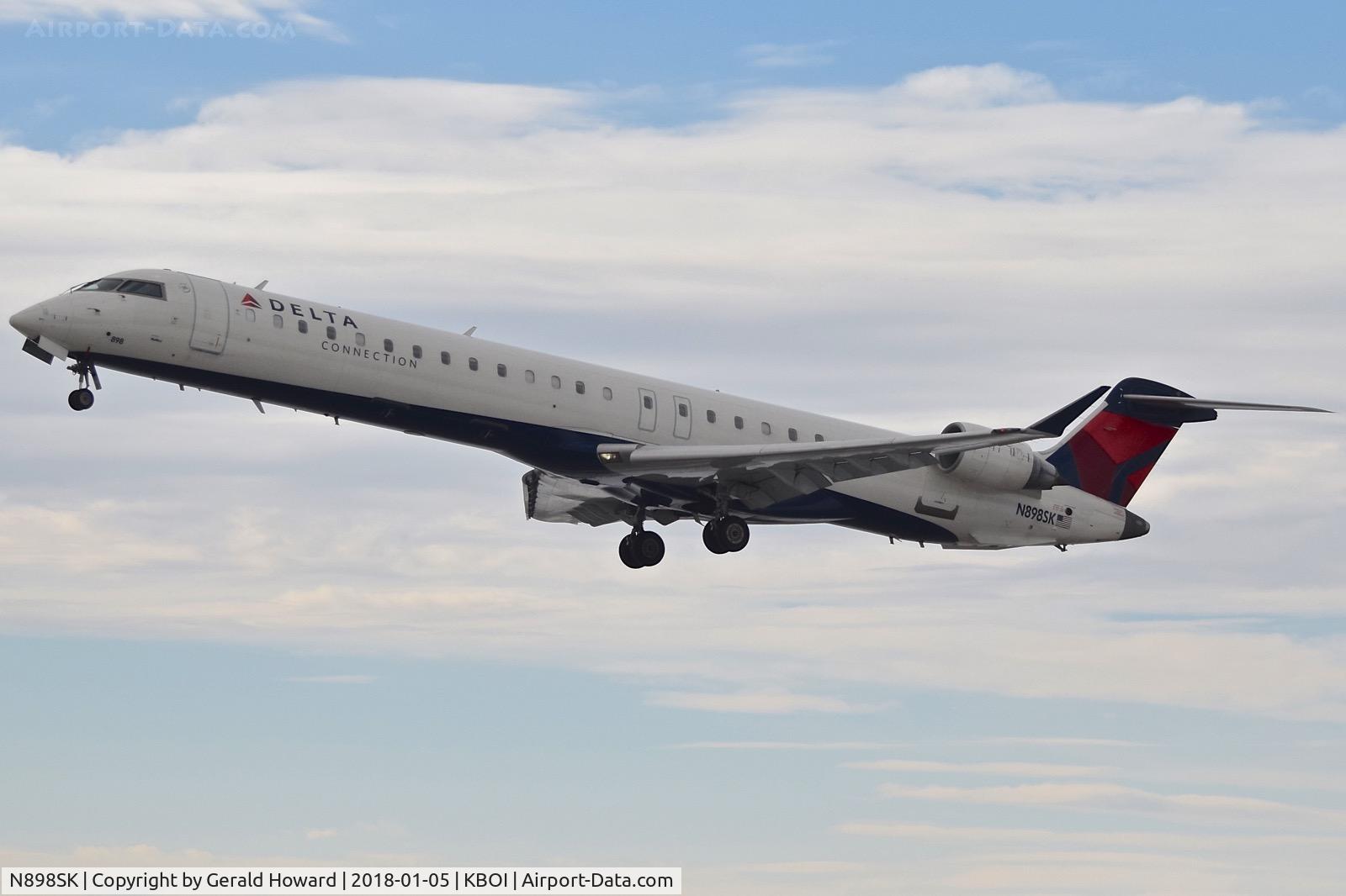N898SK, 2007 Bombardier CRJ-900 (CL-600-2D24) C/N 15110, Take off from RWY 10L.