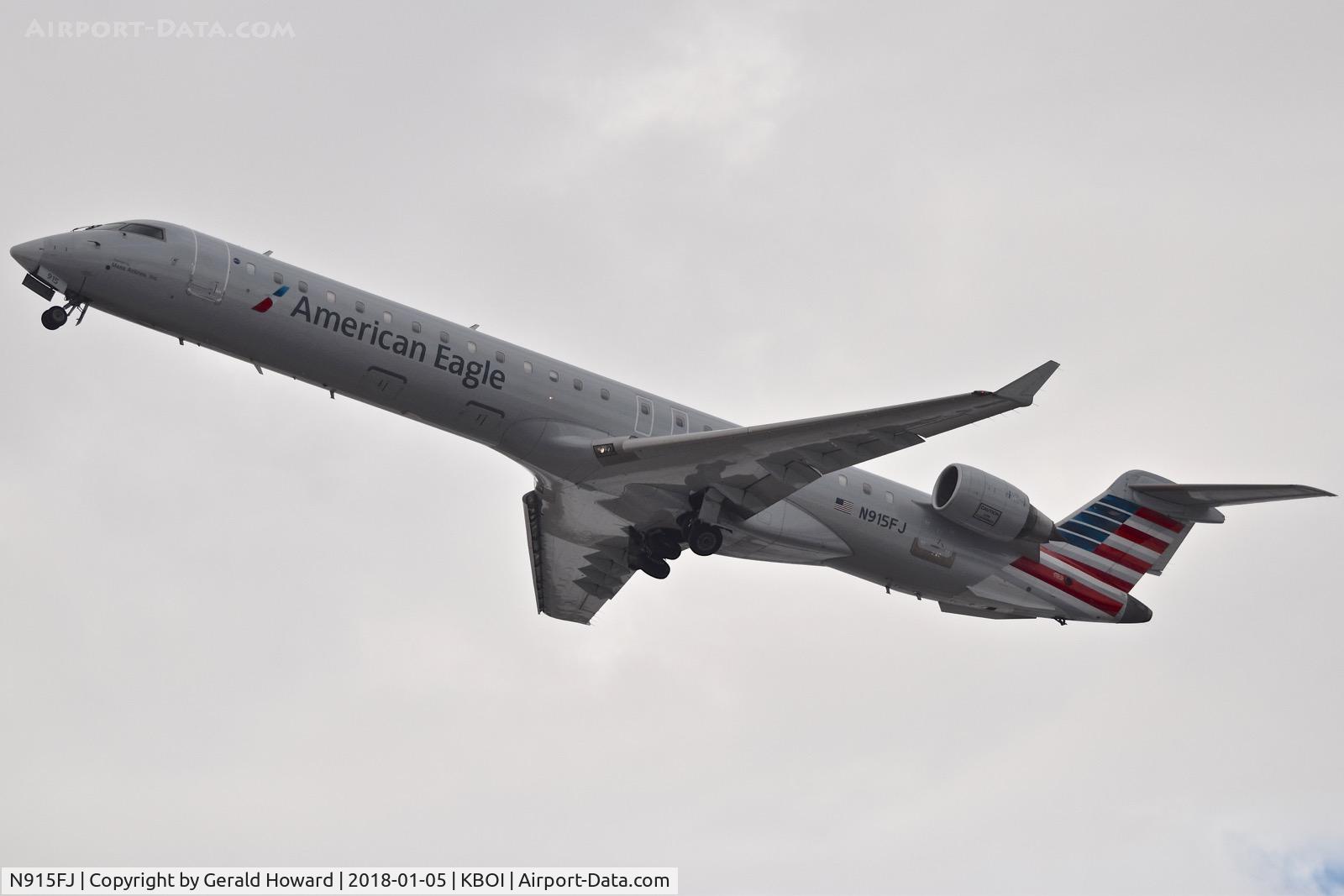 N915FJ, 2004 Bombardier CRJ900 (CL-600-2D24) C/N 15015, Departing RWY 10L.