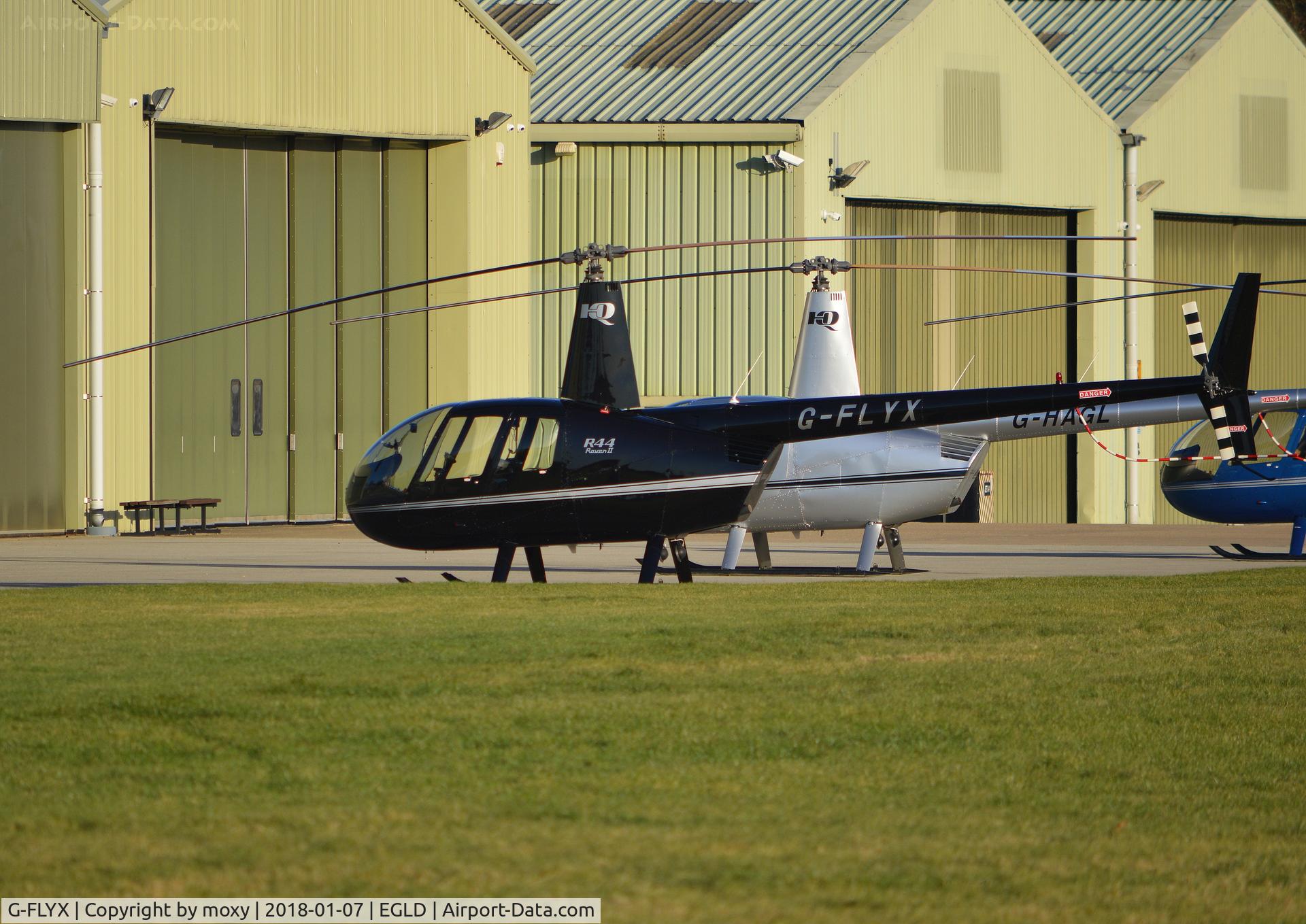G-FLYX, 2007 Robinson R44 Raven II C/N 11669, Robinson R44 Raven II at Denham.