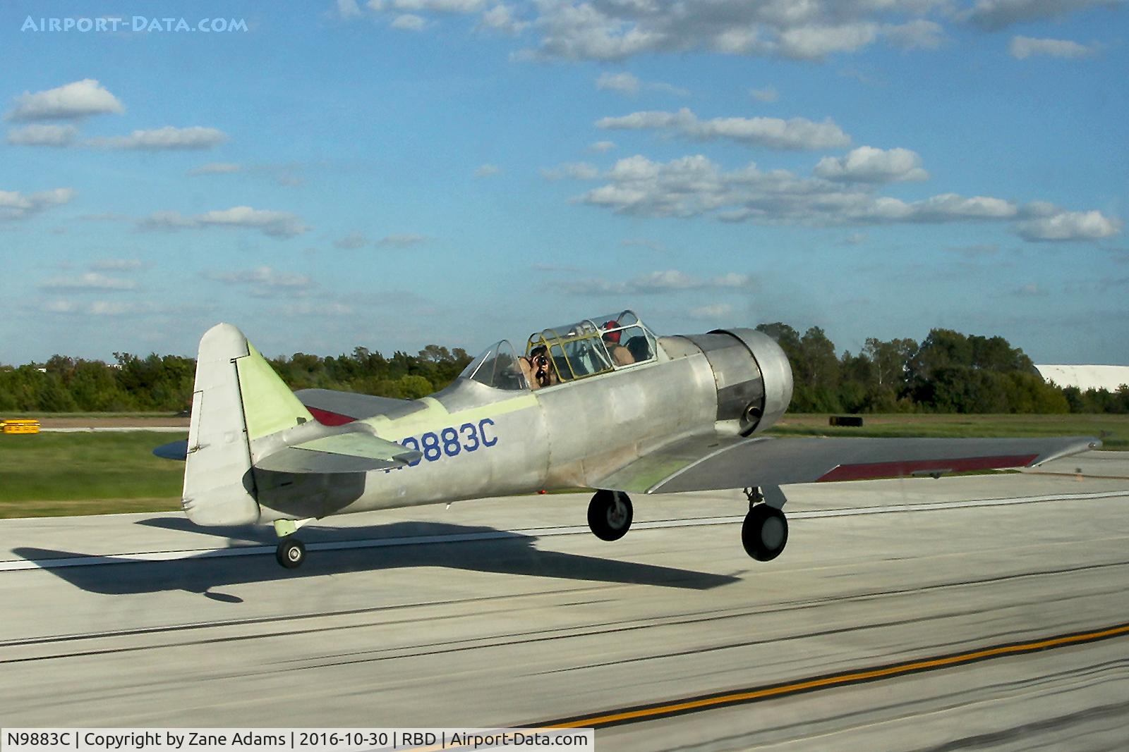 N9883C, 1969 North American T-6G Texan C/N 168-528, At the 2016 Wings Over Dallas Airshow - departing on a photo shoot