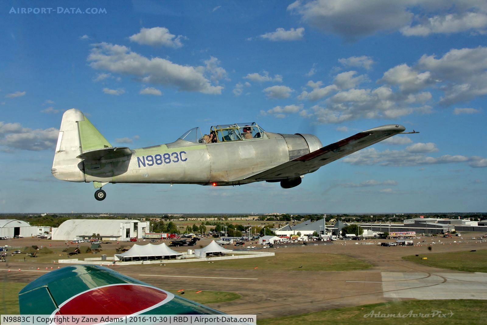 N9883C, 1969 North American T-6G Texan C/N 168-528, At the 2016 Wings Over Dallas Airshow - departing on a photo shoot