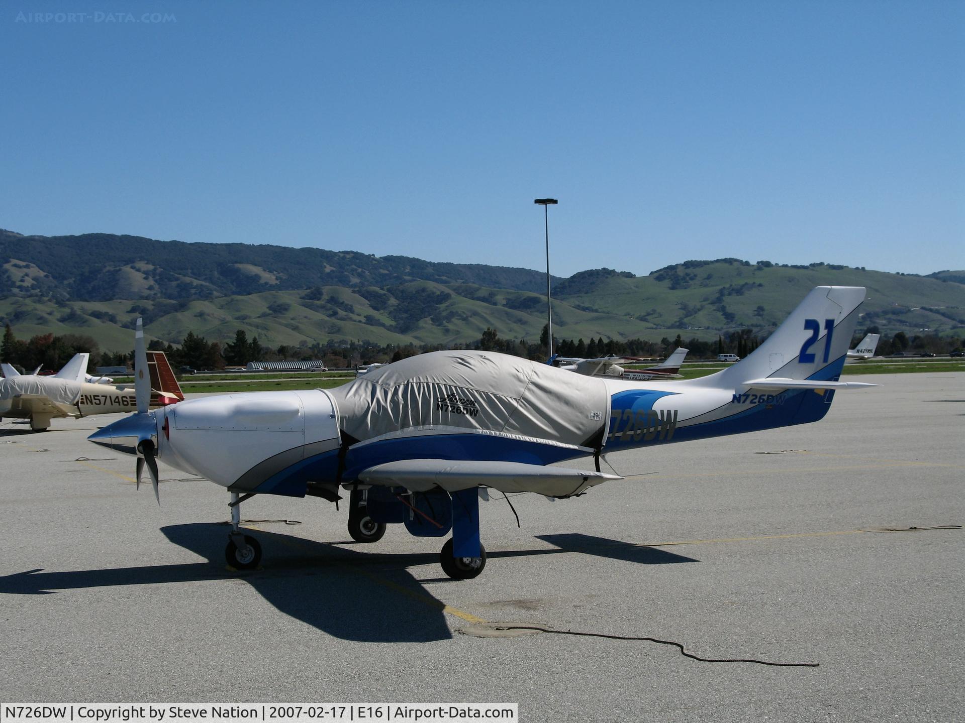 N726DW, 2006 Lancair Legacy C/N L2K-261, 2006 Lancair Legacy on visitor's ramp @ South County Airport of Santa Clara County, San Martin, CA (Race #21 for Reno with canopy covered)
