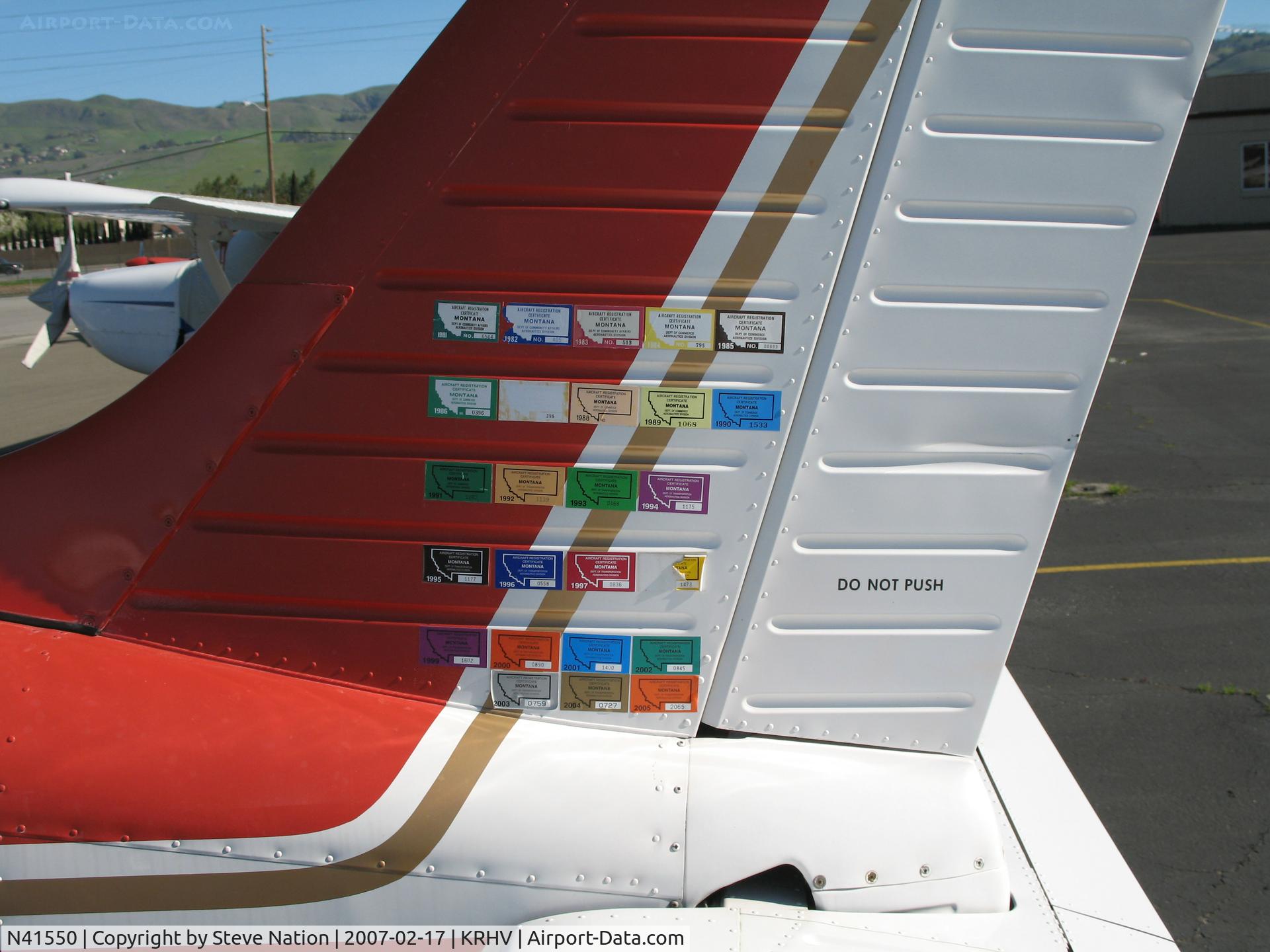 N41550, 1974 Piper PA-28-151 Cherokee C/N 28-7415266, Close-up tail of MT annual registration stickers on Gary Pester Farms (Hingham, MT) 1974 Piper PA-151 Cherokee @ Reid-Hillview Airport (San Jose), CA
