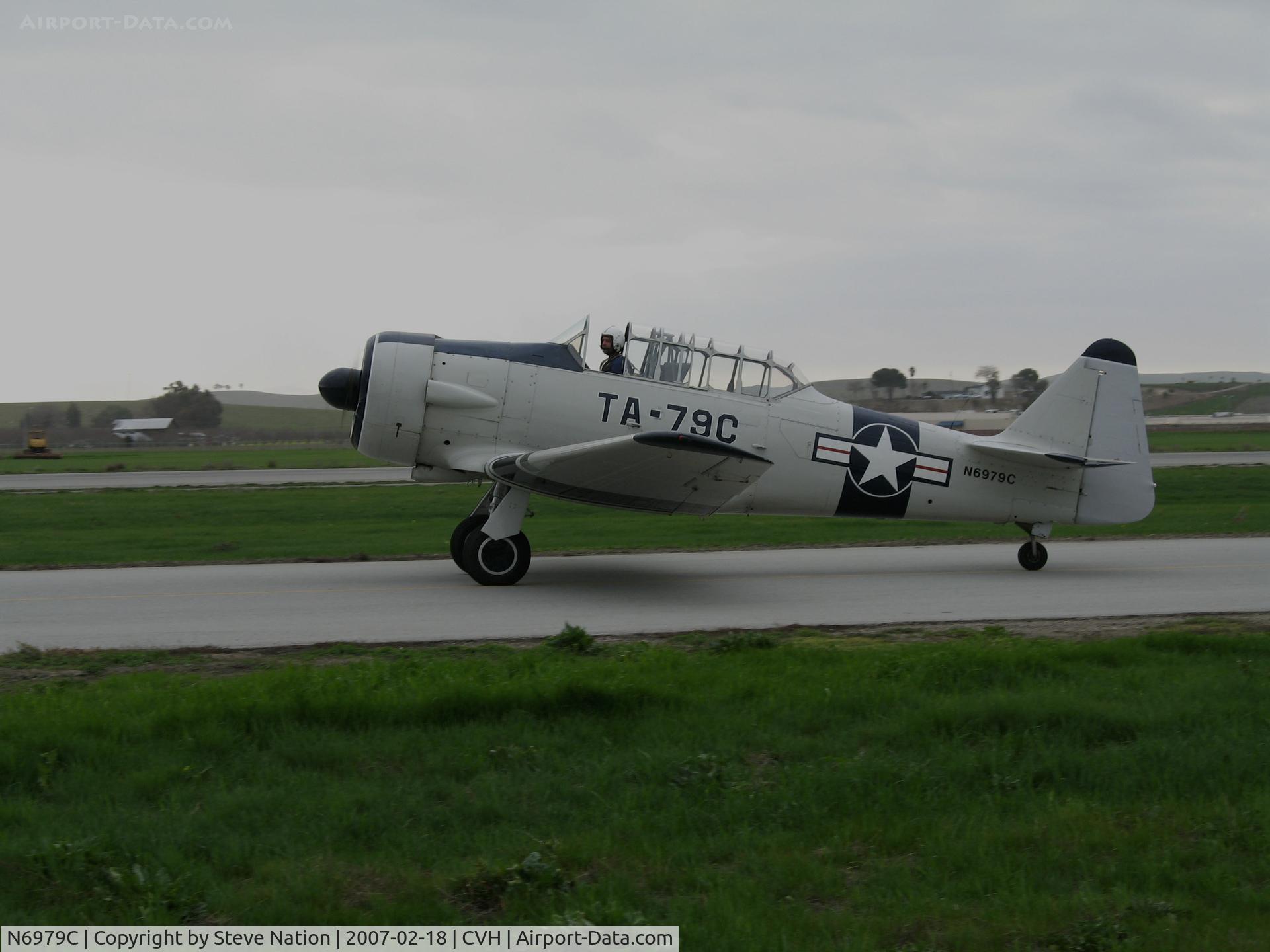 N6979C, North American AT-6D Texan C/N 42-85408, North American AT-6D in USAF c/s with TA-79C code rolling out @ Hollister Municipal Airport, CA