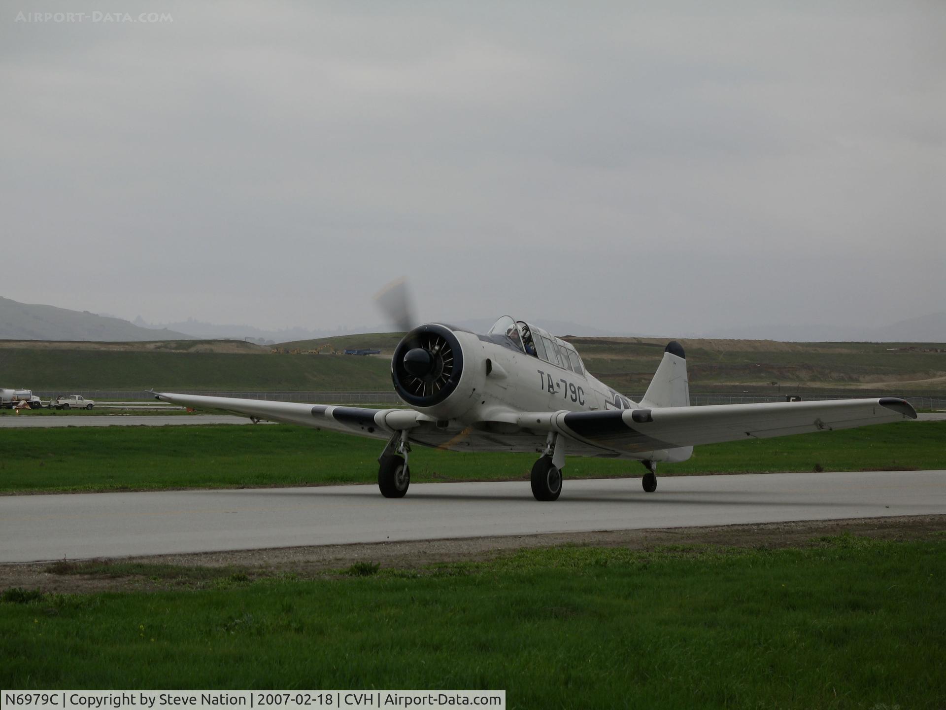 N6979C, North American AT-6D Texan C/N 42-85408, North American AT-6D in USAF c/s with TA-79C code taxiing @ Hollister Municipal Airport, CA