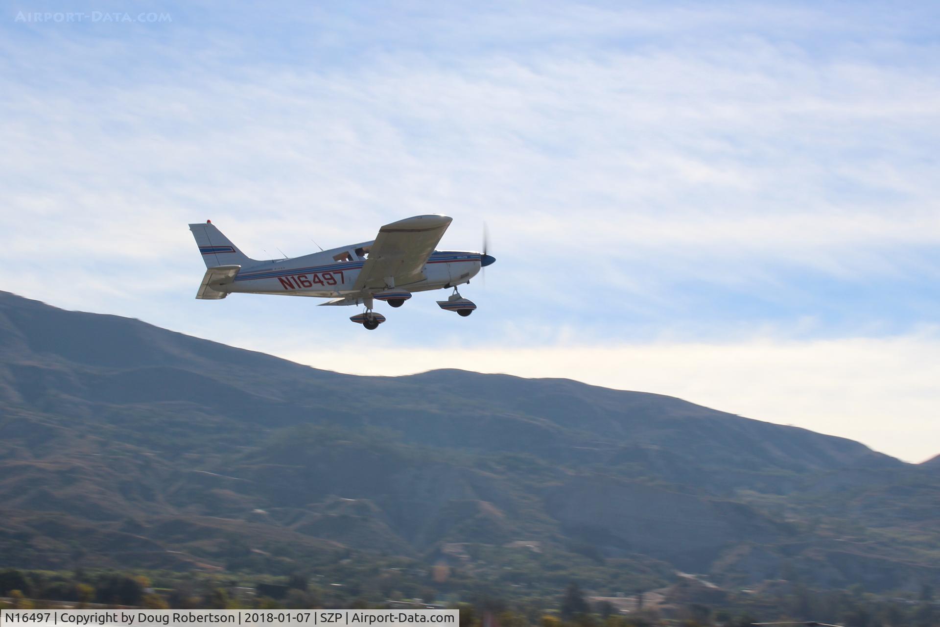 N16497, 1973 Piper PA-28-235 Cherokee Charger C/N 28-7310101, 1973 Piper PA-28-235 CHARGER, Lycoming O-540-D4B5 235 Hp, takeoff climb Rwy 22, Young Eagles flight