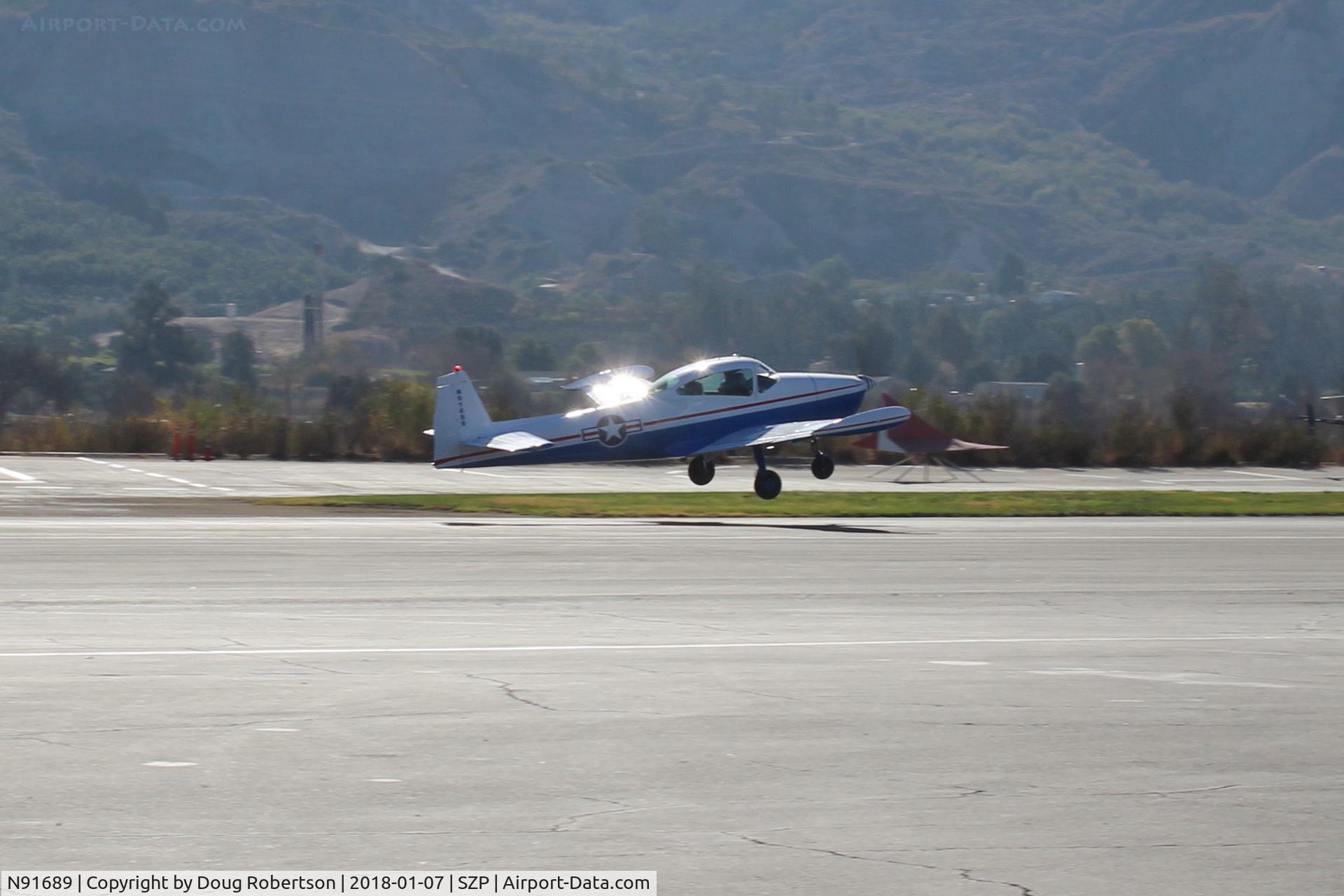 N91689, 1946 North American Navion (NA-145) C/N NAV-4-431, 1946 North American NAVION, Continental E225 upgrade, arrival landing Rwy 22 to give Young Eagles flights