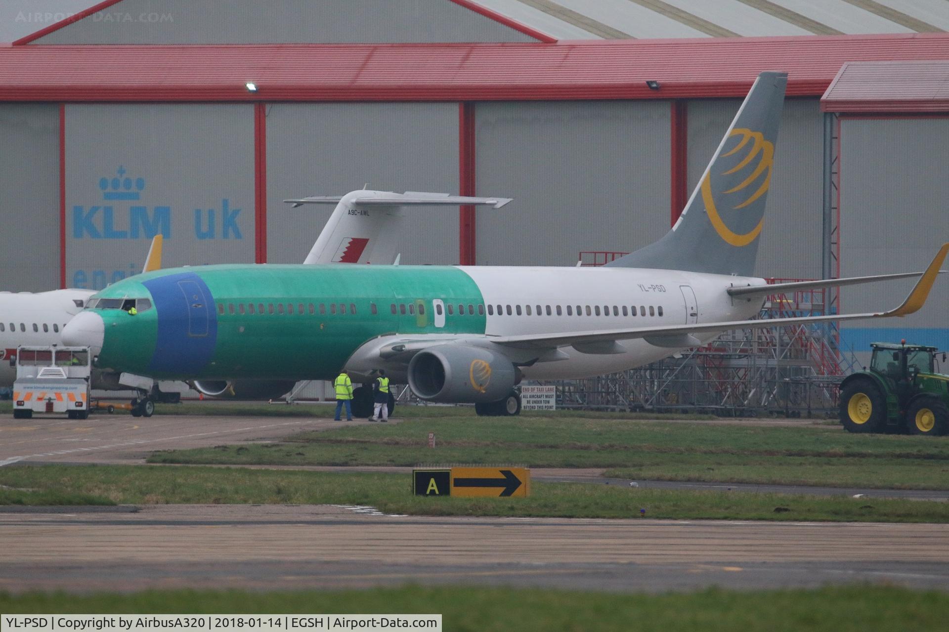 YL-PSD, 2000 Boeing 737-86N C/N 28618, Emerging from KLM hangar following skin replacement work