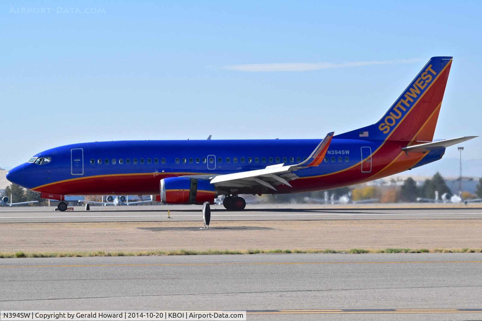 N394SW, 1994 Boeing 737-3H4 C/N 27380, Landing roll out on RWY 10L.