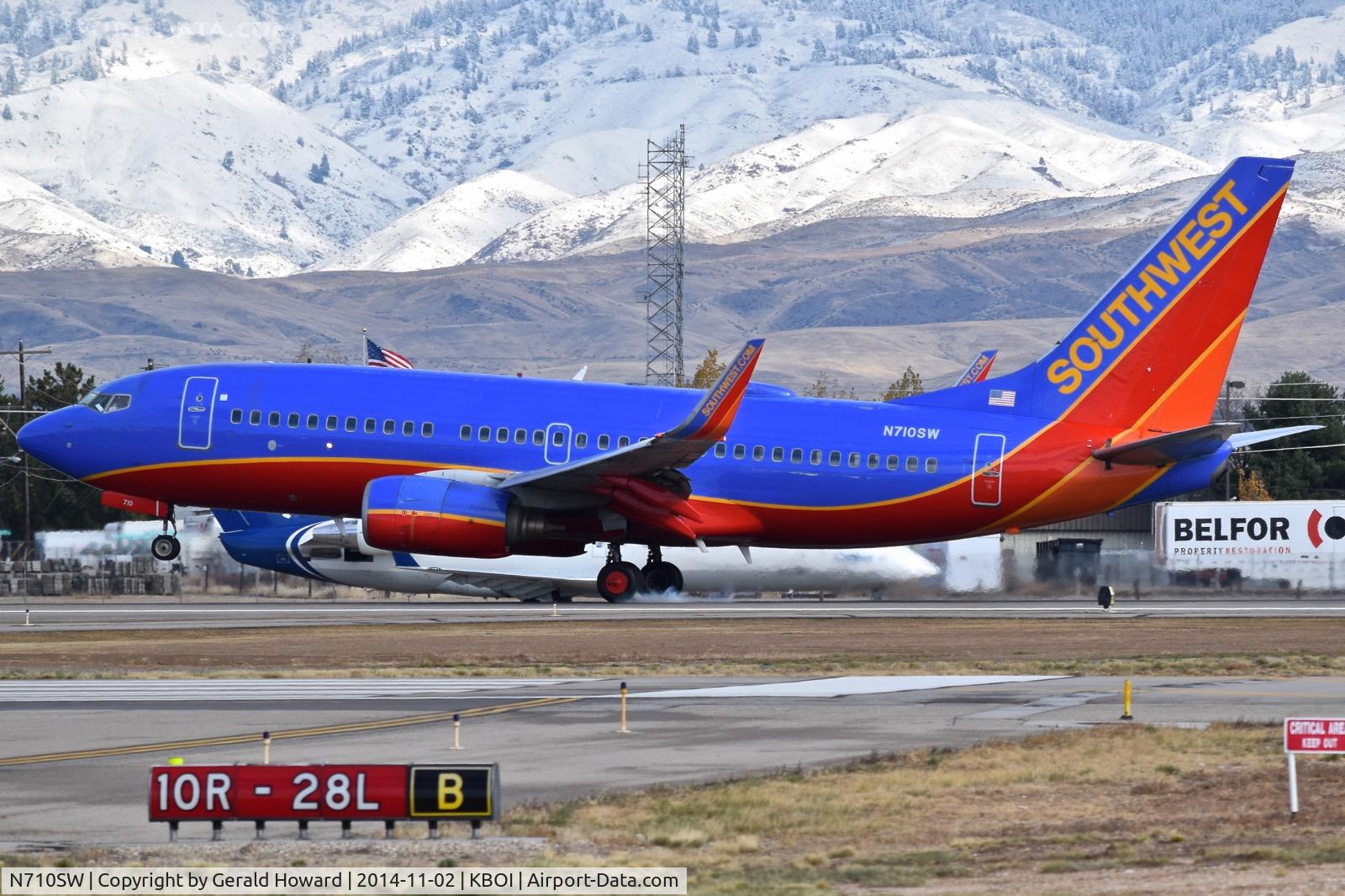 N710SW, 1998 Boeing 737-7H4 C/N 27844, Touch down on RWY 28R.