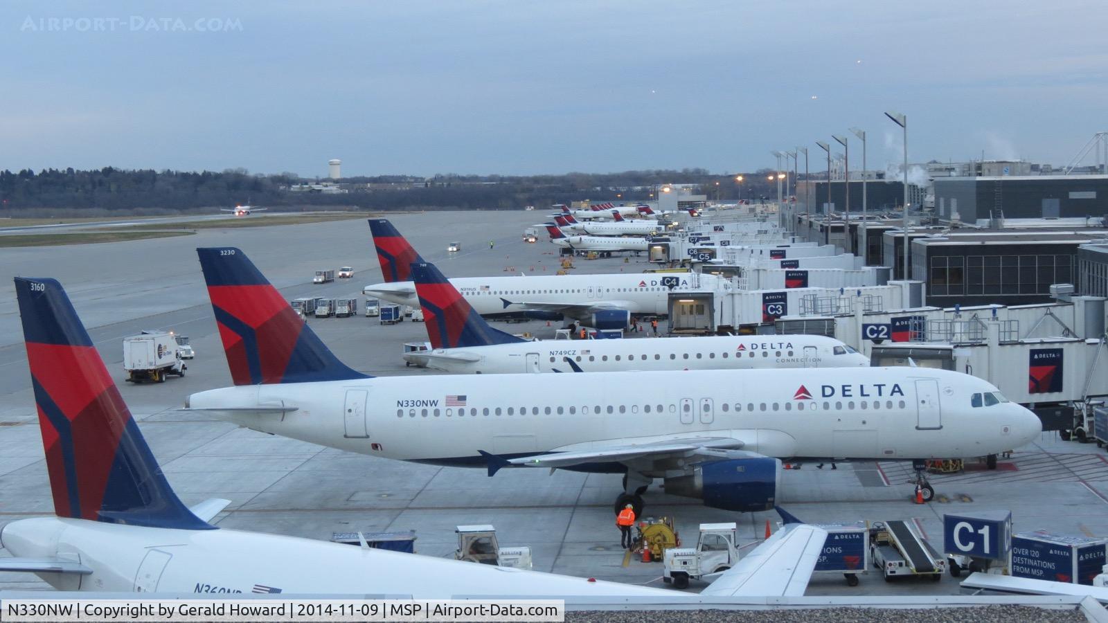 N330NW, 1992 Airbus A320-211 C/N 307, Parked at the C concourse.