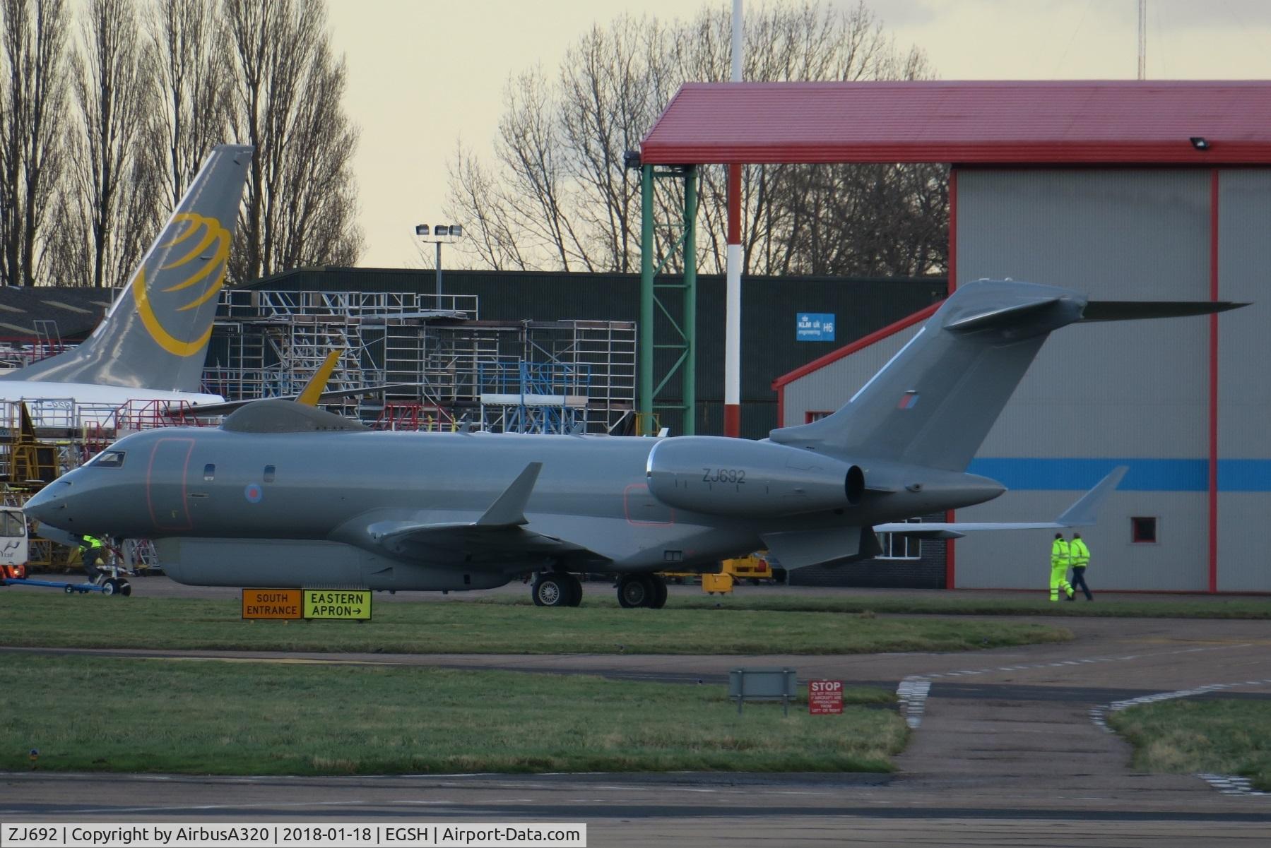 ZJ692, 2008 Bombardier BD-700-1A10 Sentinel R1 C/N 9131, Being towed from Air livery to KLM following repaint with Air livery