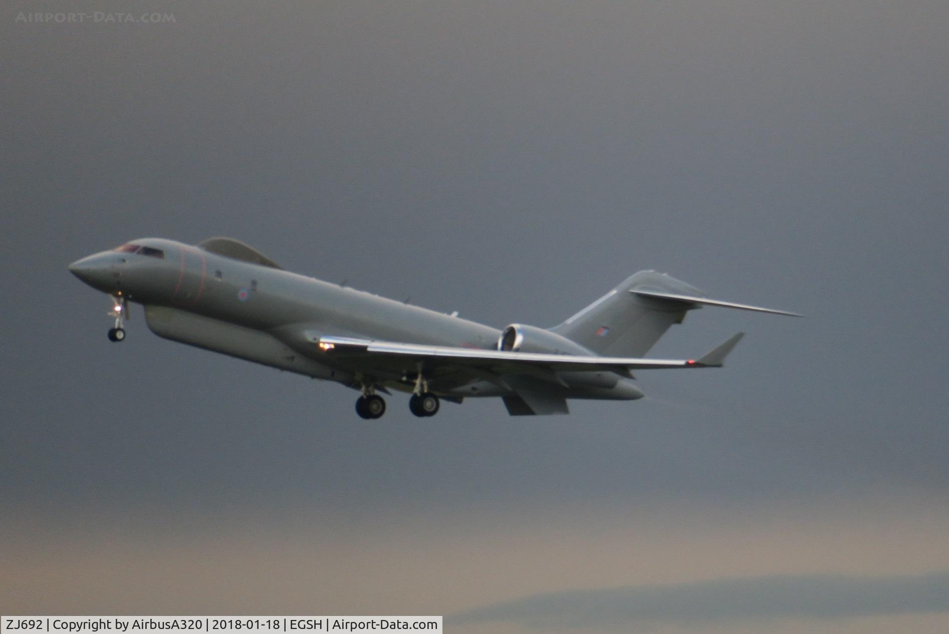 ZJ692, 2008 Bombardier BD-700-1A10 Sentinel R1 C/N 9131, Departing a wet January day from Norwich