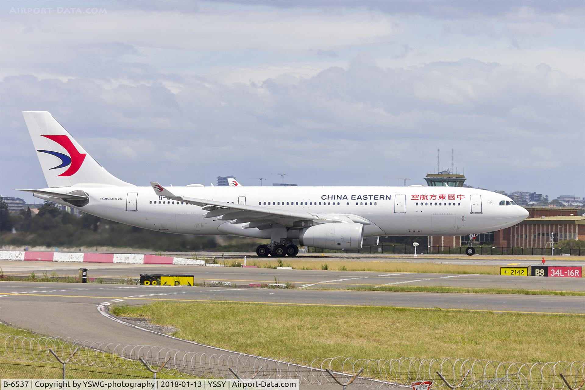 B-6537, 2011 Airbus A330-243 C/N 1262, China Eastern Airlines (B-6537) Airbus A330-243 departing Sydney Airport