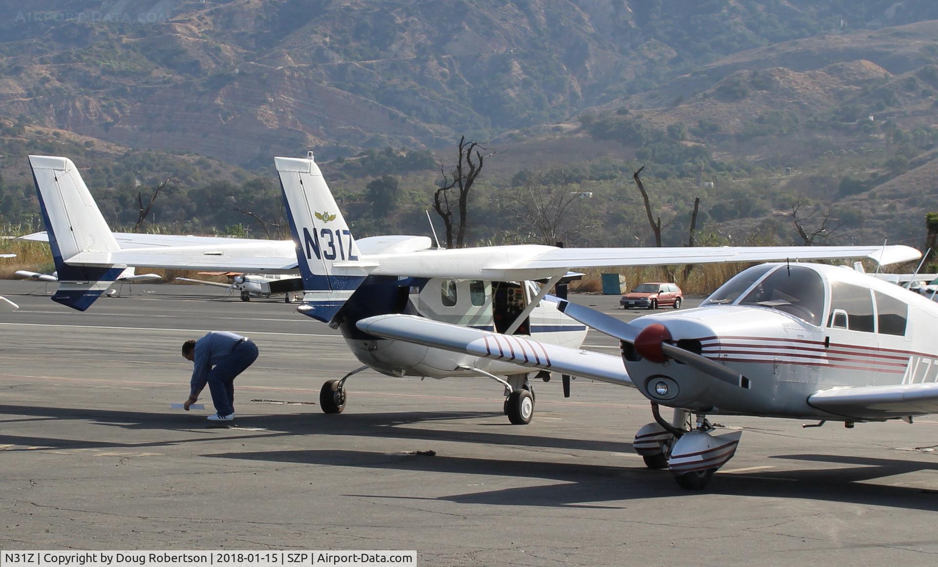 N31Z, 1973 Cessna T337G Turbo Super Skymaster C/N P3370028, 1973 Cessna T337G SUPER SKYMASTER, two turbocharged & fuel-injected Continental TSIO-360-C 225 Hp each center-line thrust, retractable tri-gear, on transient ramp