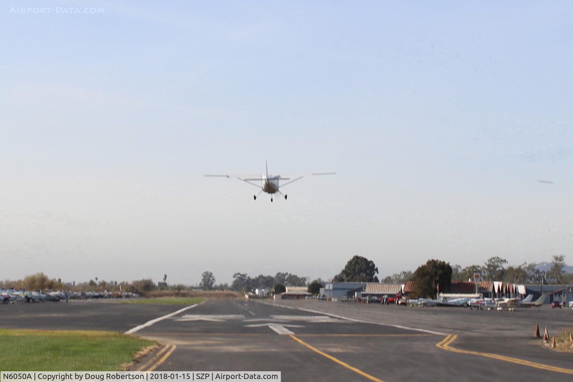 N6050A, Cessna 162 Skycatcher C/N 16200186, 2011 Cessna 162 SKYCATCHER, Continental O-200 100 Hp, Light-Sport aircraft, landing Rwy 22. Photo taken from behind the aircraft.