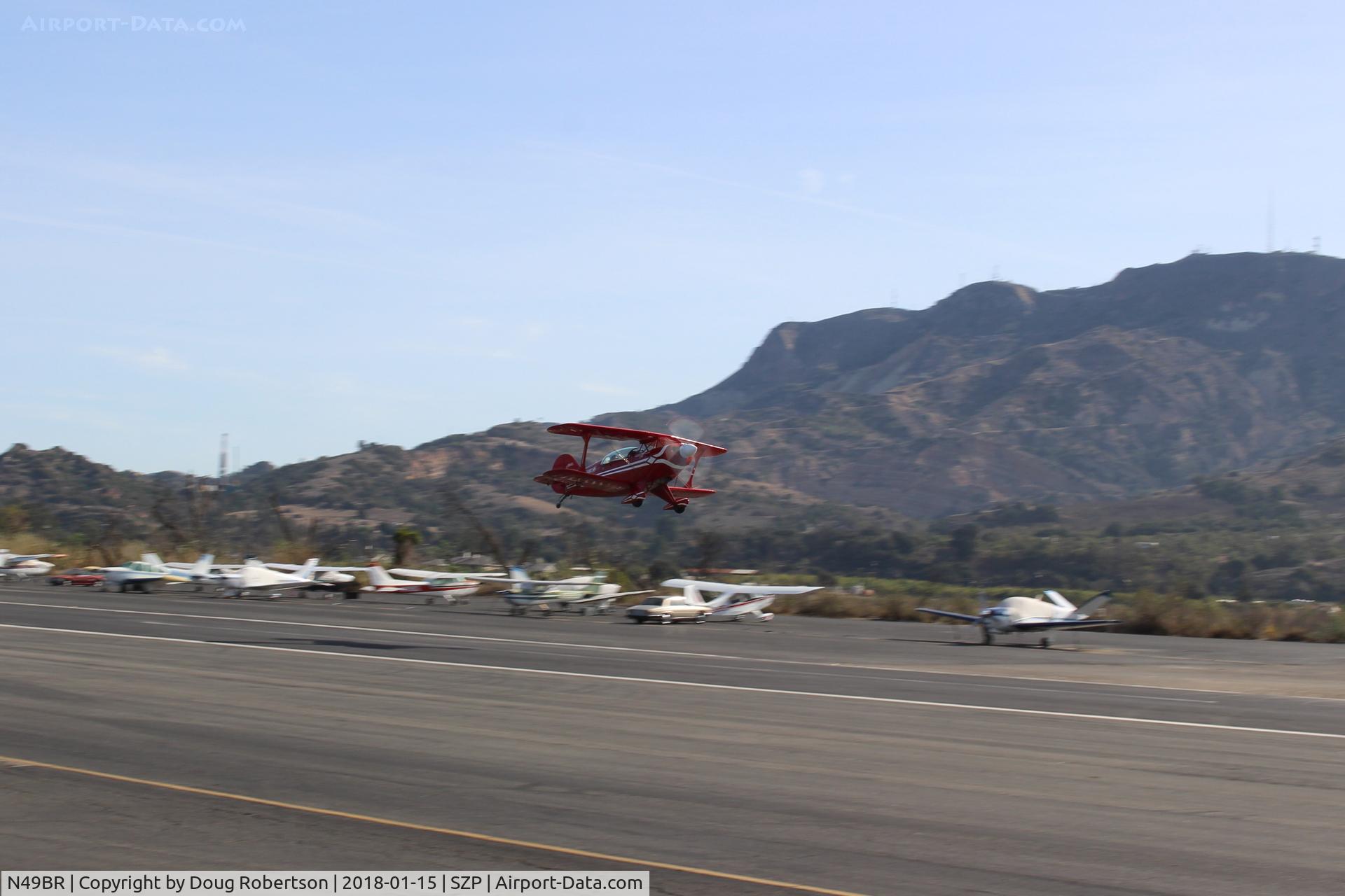 N49BR, Pitts S-2A Special C/N 2212, 1983 Aerotek PITTS S-2A SPECIAL, Lycoming AEIO-360 180 Hp, takeoff climb Rwy 22