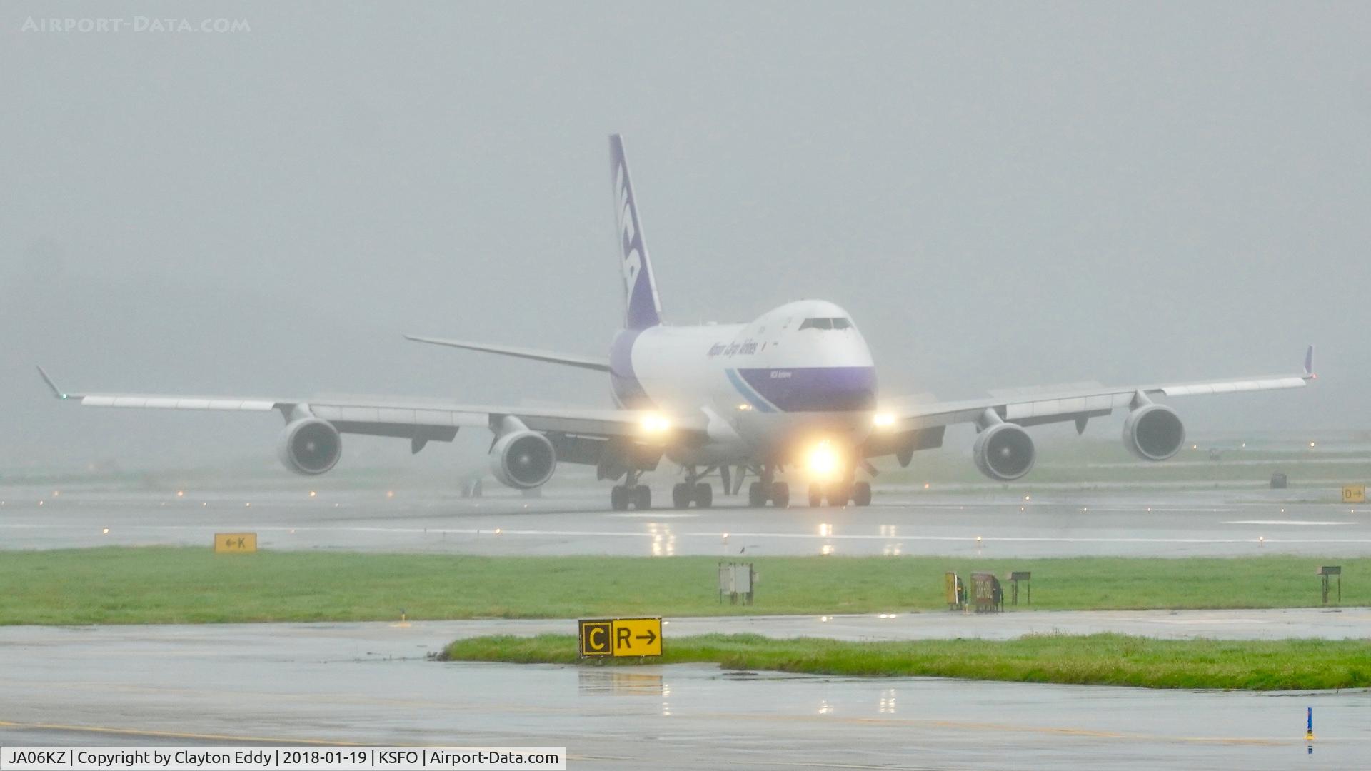 JA06KZ, 2007 Boeing 747-4KZF SCD C/N 36133, Landing on a rainy SFO day. 2018.
