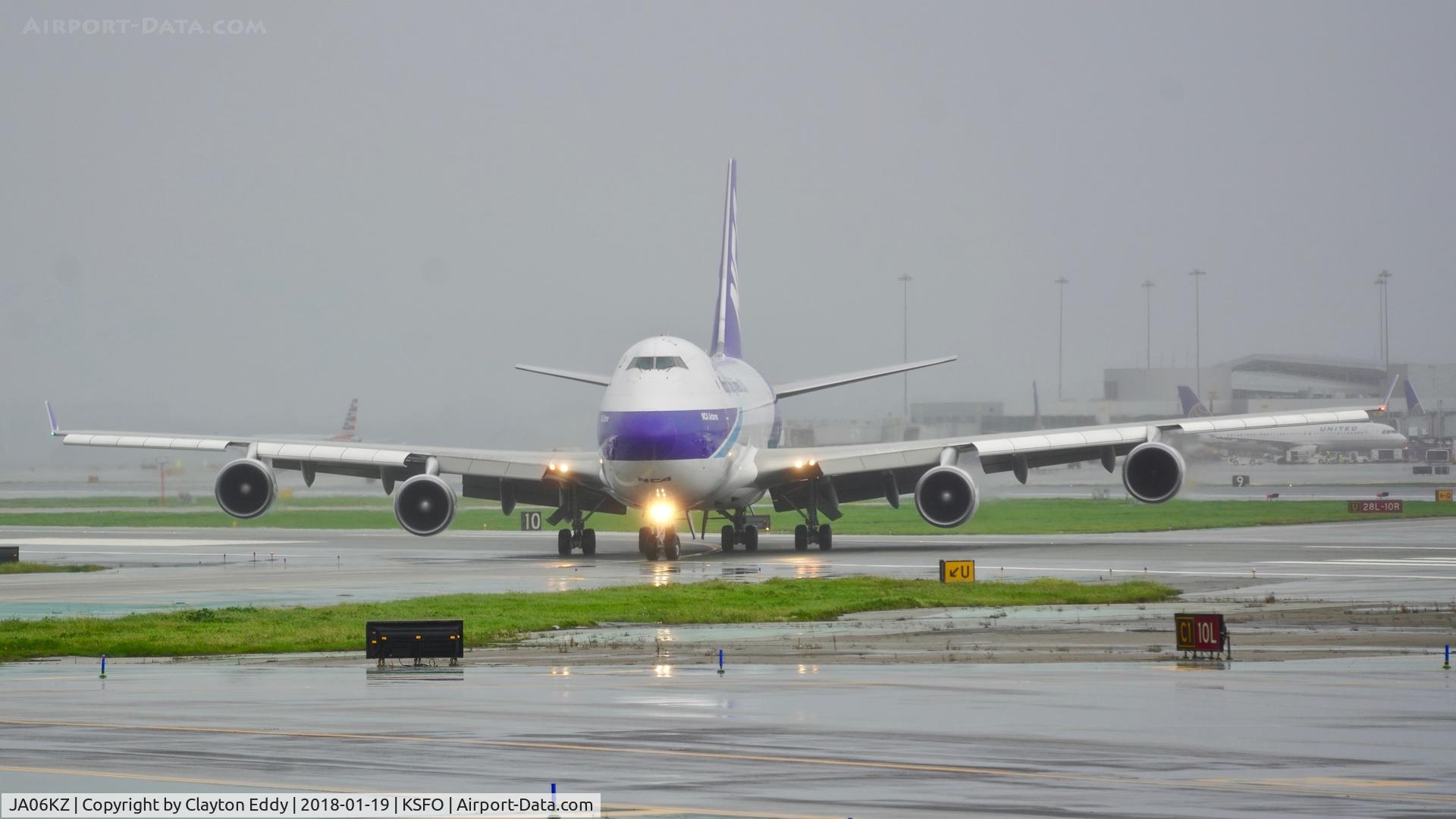JA06KZ, 2007 Boeing 747-4KZF SCD C/N 36133, Landing on a rainy SFO day. 2018.