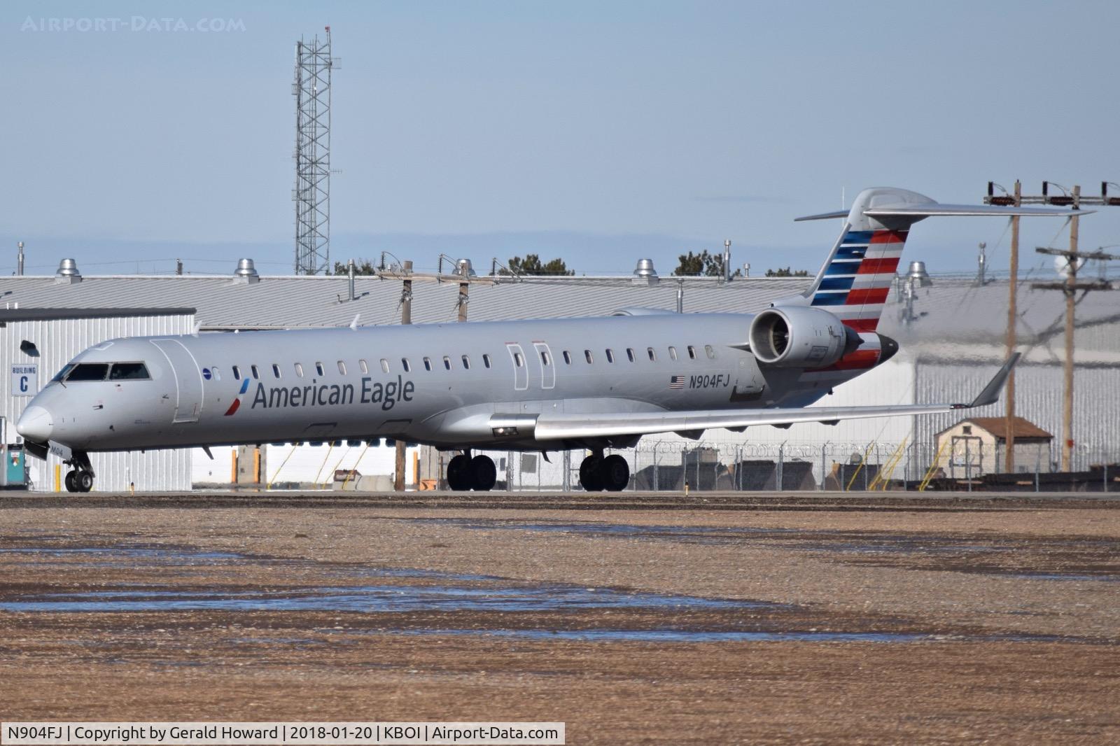 N904FJ, 2003 Bombardier CRJ-900ER (CL-600-2D24) C/N 15004, Holding on Alpha for RWY 28R. Call sign 