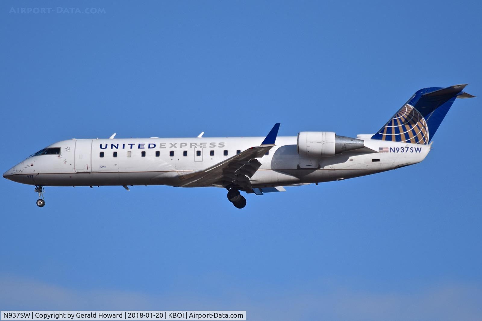 N937SW, 2003 Bombardier CRJ-200LR (CL-600-2B19) C/N 7735, Landing 28R.