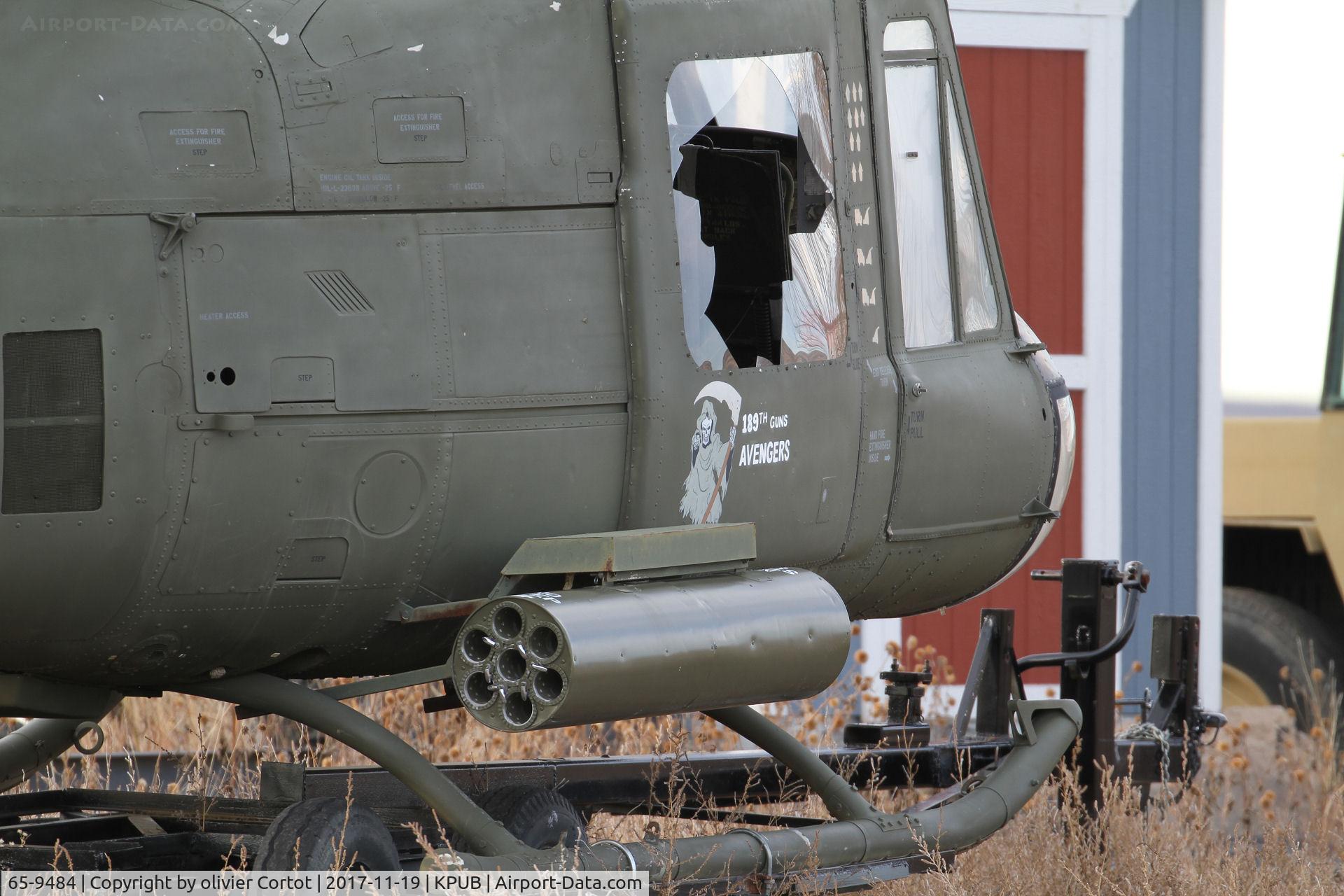 65-9484, 1965 Bell UH-1M Iroquois C/N 1384, broken glass and rocket launcher