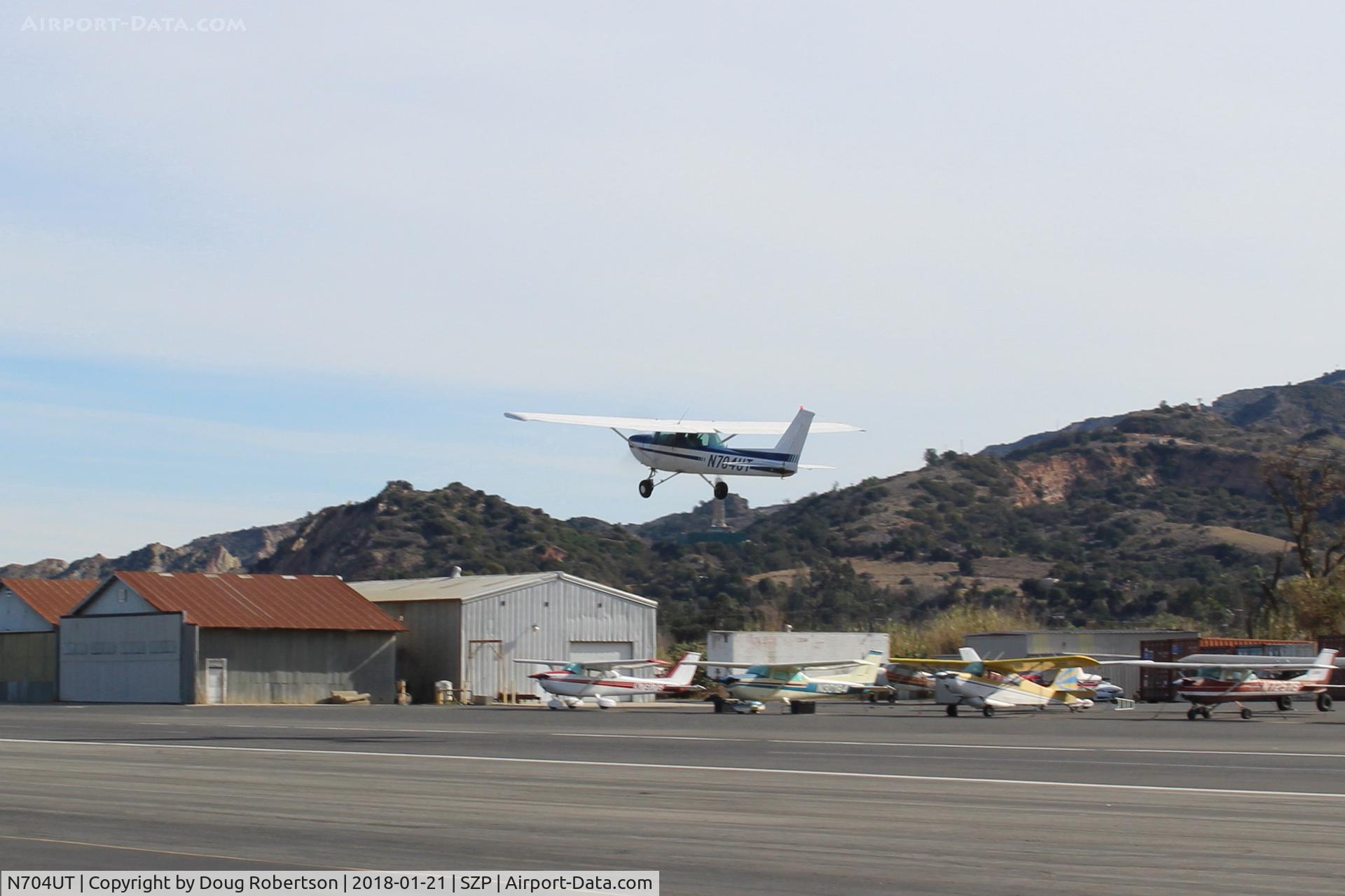 N704UT, 1976 Cessna 150M C/N 15078891, 1976 Cessna 150M, Continental O-200-100 Hp, takeoff climb Rwy 04