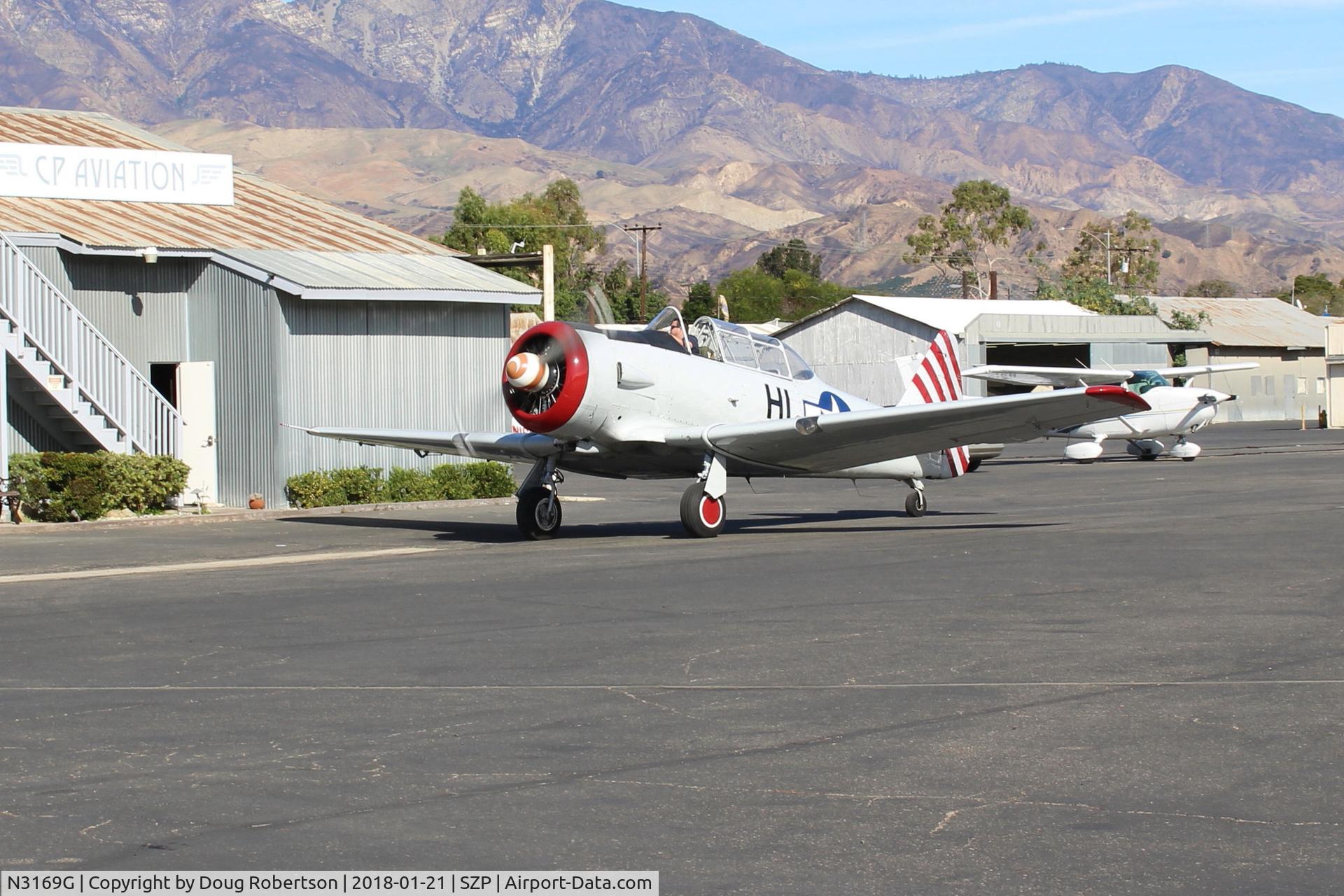 N3169G, 1945 North American AT-6F Texan C/N 121-42937, 1945 North American AT-6F TEXAN 'Daring Diane' of the Condor Squadron, P&W R-1340 550 Hp, taxi to Fuel Dock
